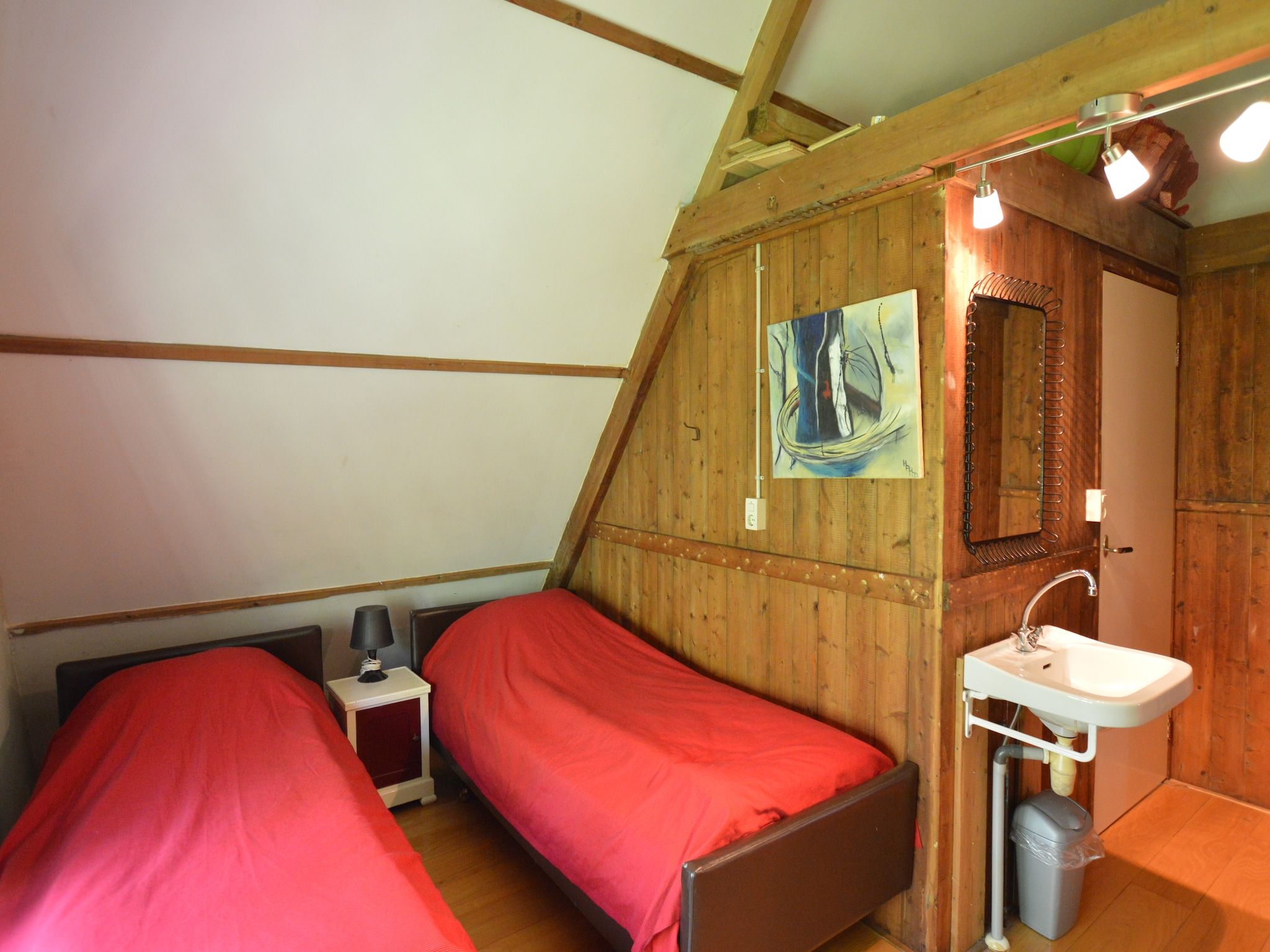 Een slaapkamer van De Wildenberg in Zuidwolde