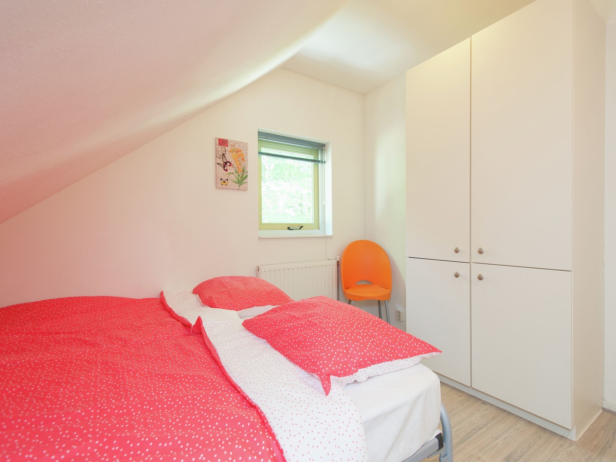 Een slaapkamer van De Meerkoet in Oudemirdum