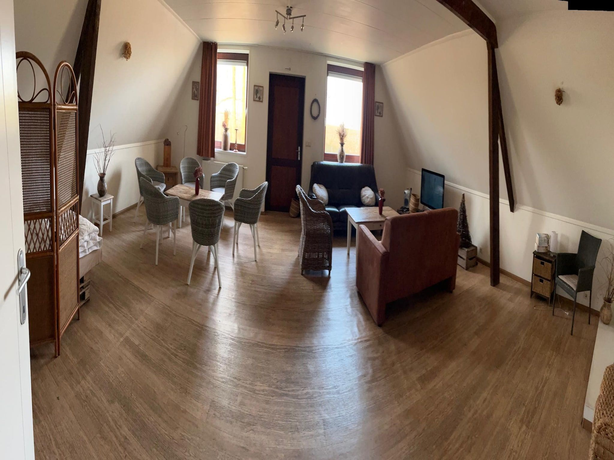 De woonkamer van Appartement De Hooizolder in Eede