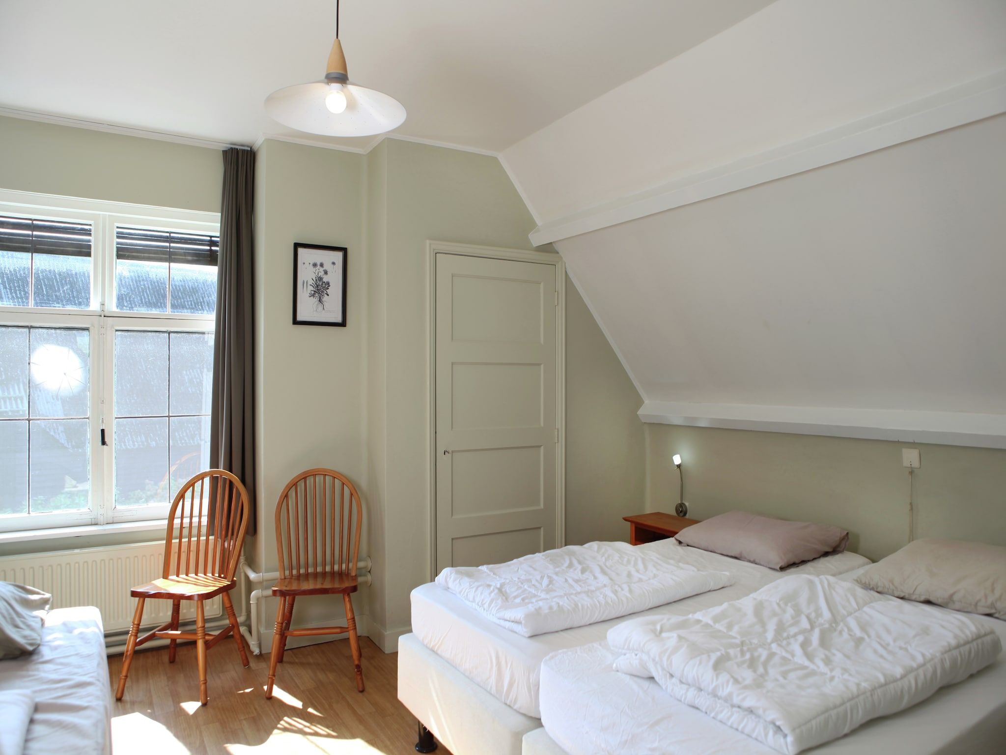 Een slaapkamer van De Biezenpolder 't Groothuus in Eede