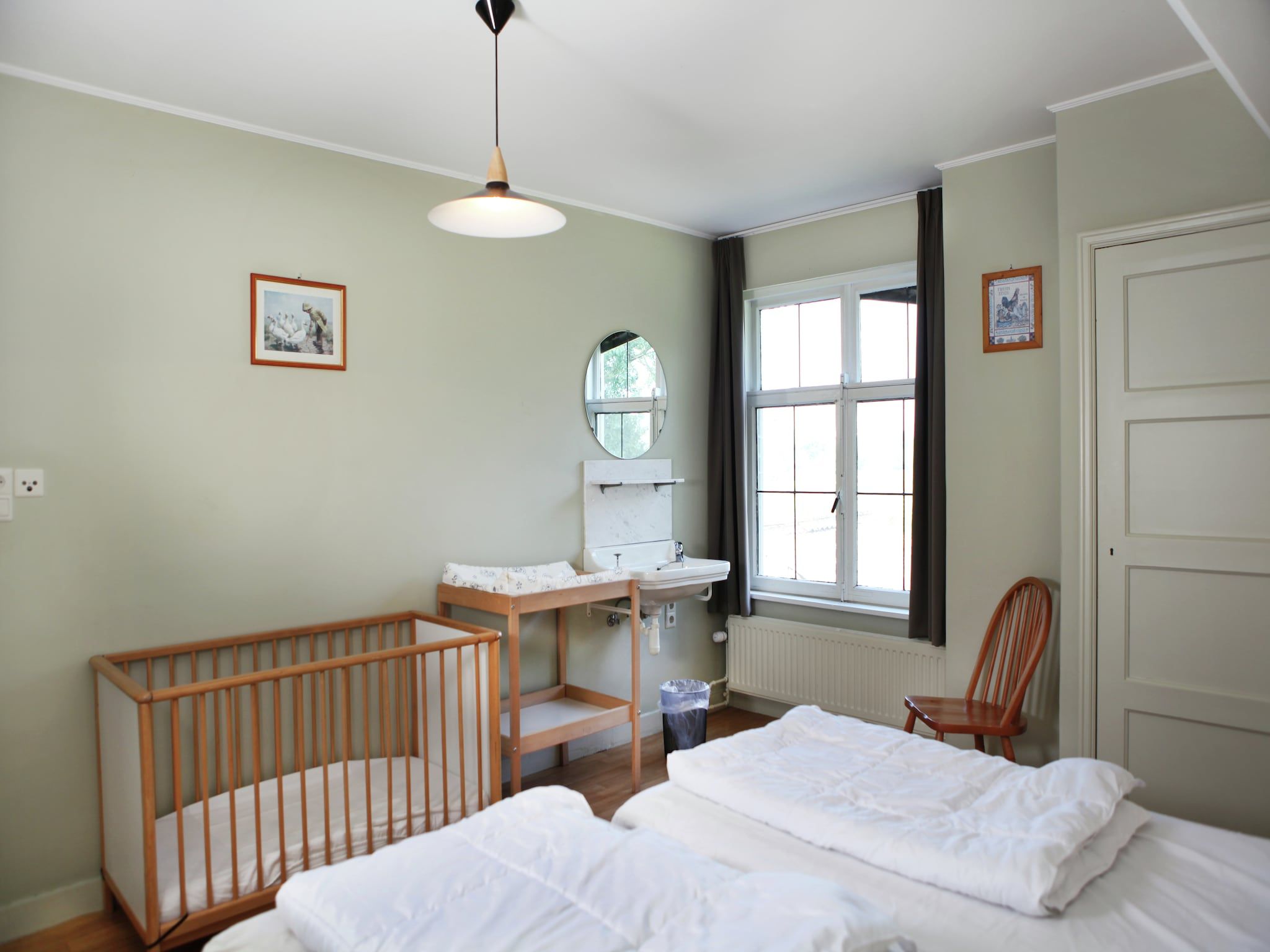 Een slaapkamer van De Biezenpolder 't Groothuus in Eede