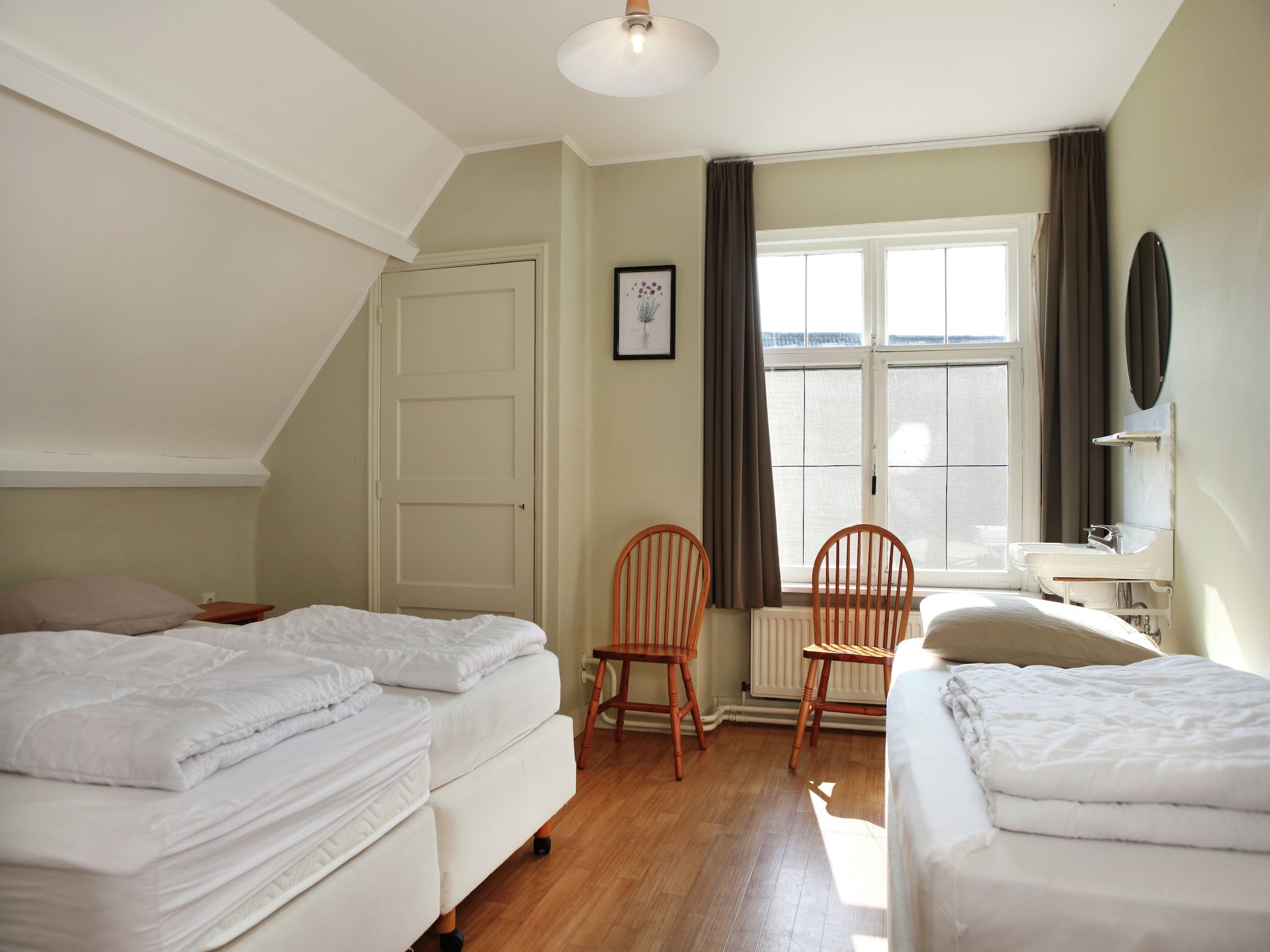 Een slaapkamer van De Biezenpolder 't Groothuus in Eede