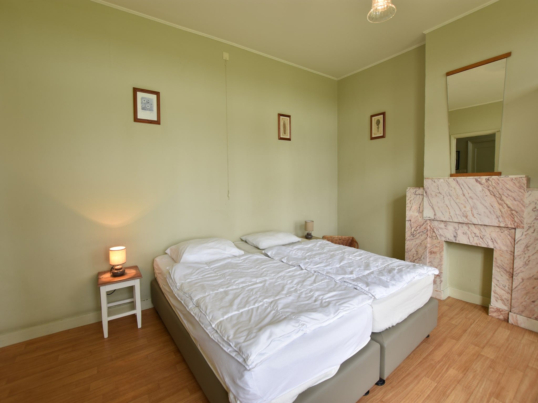 Een slaapkamer van De Biezenpolder 't Groothuus in Eede