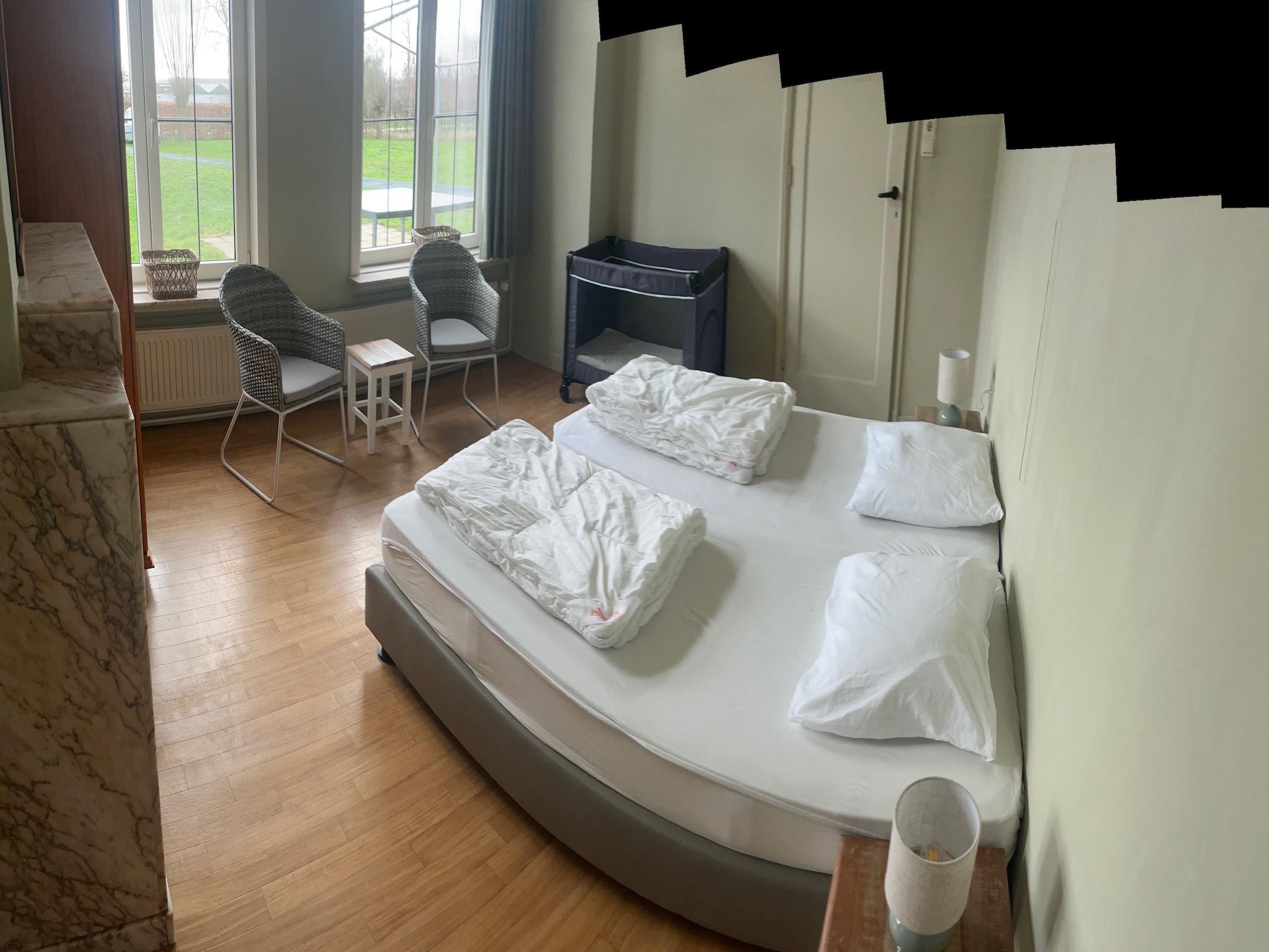 Een slaapkamer van De Biezenpolder 't Groothuus in Eede