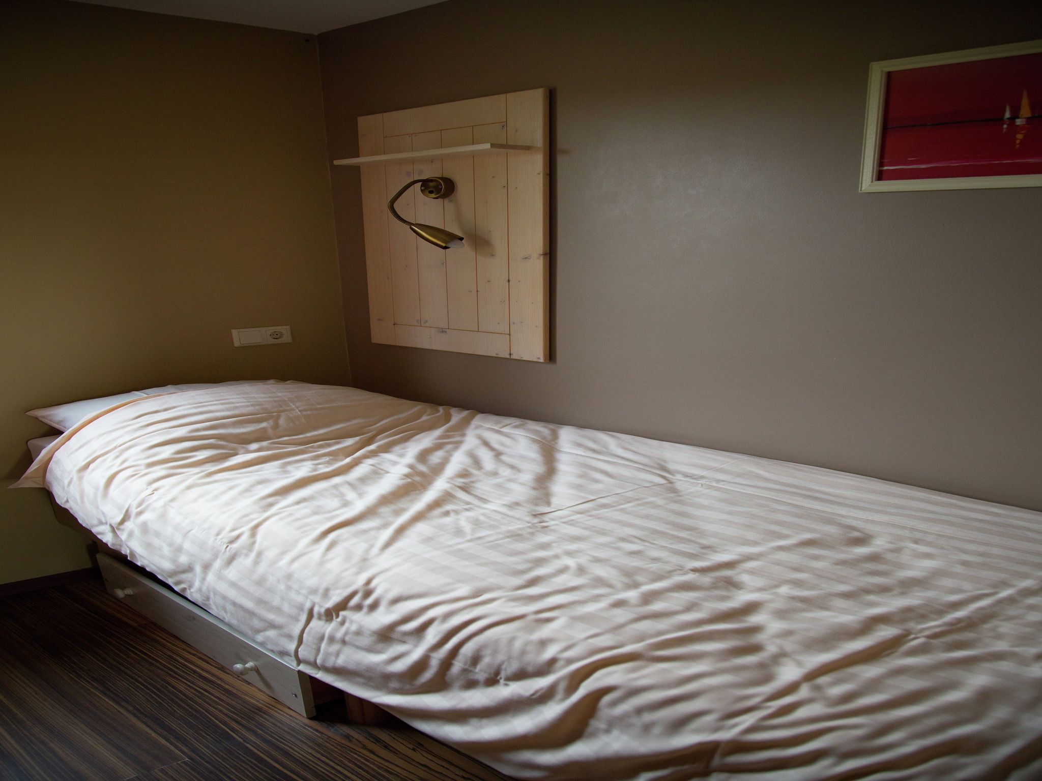 Een slaapkamer van Strandpark Vlugtenburg 2 in 's-Gravenzande