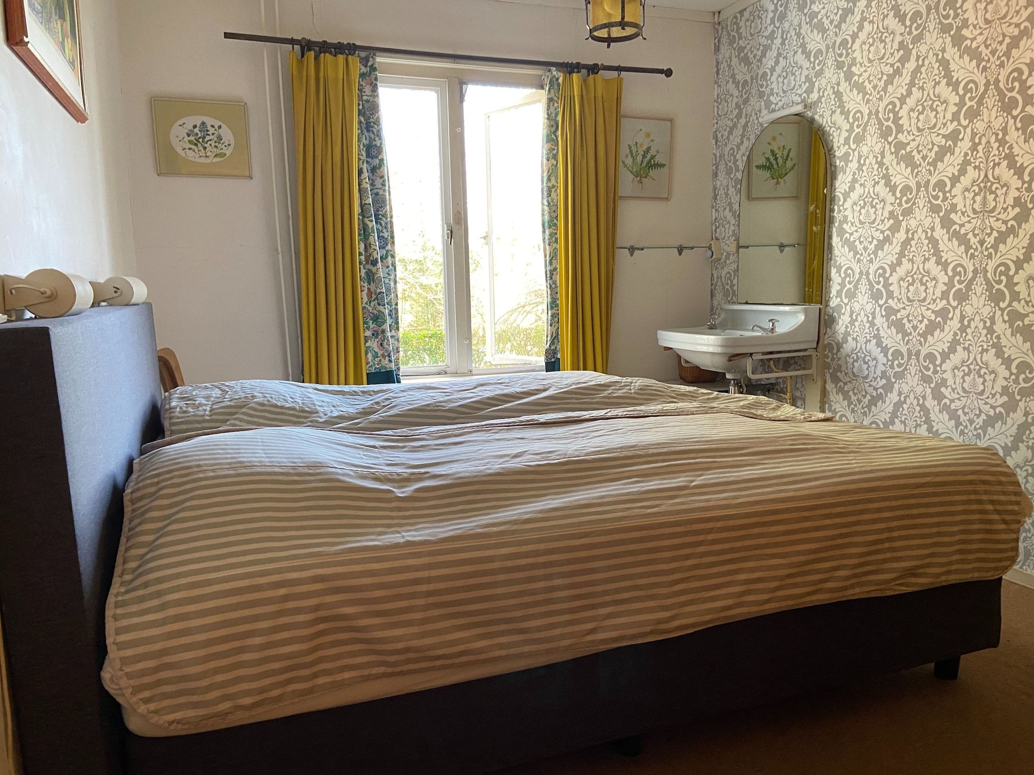 Een slaapkamer van Huis in het bos in Oploo