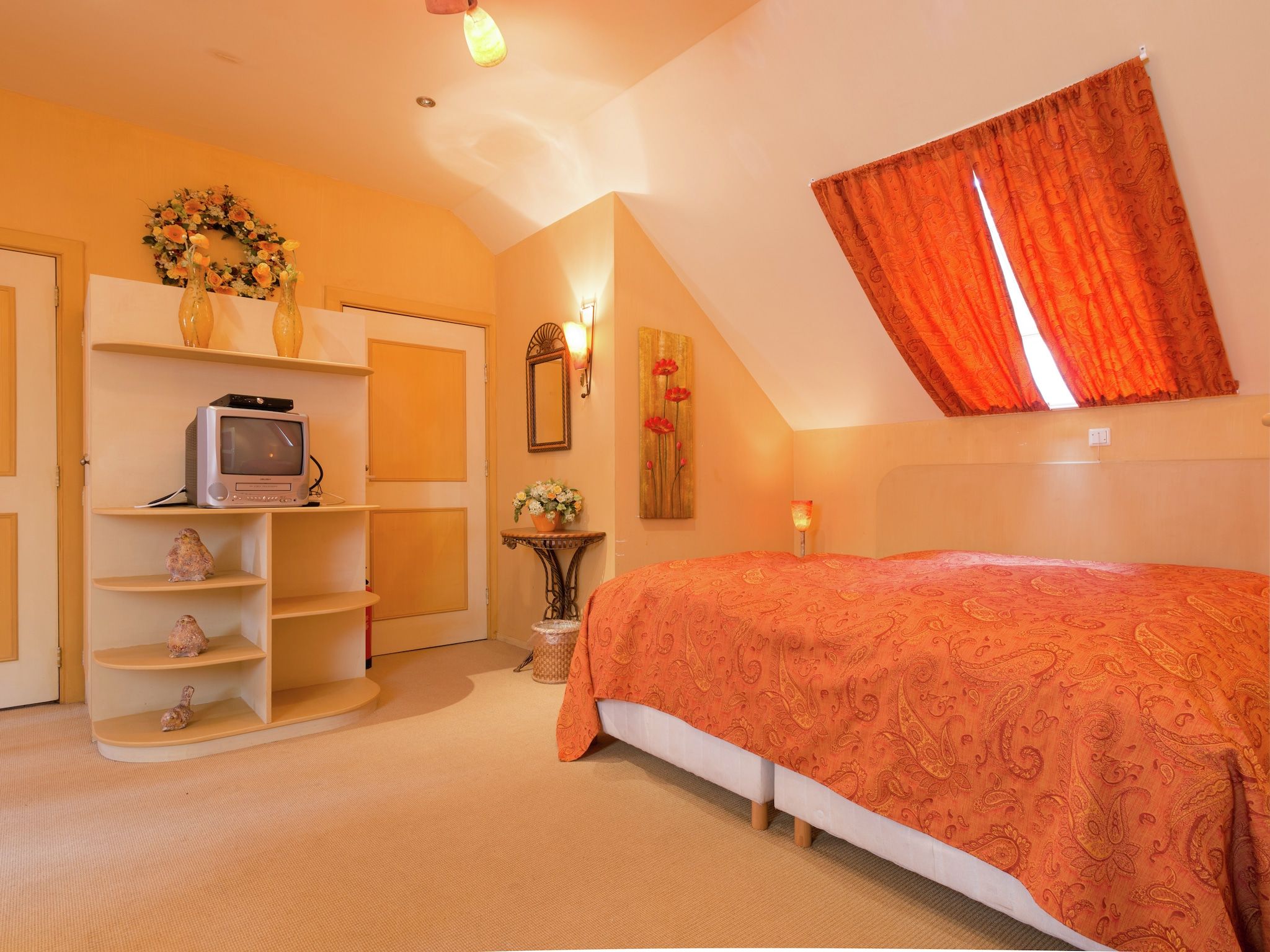 Een slaapkamer van De Eekhorst in Balkbrug