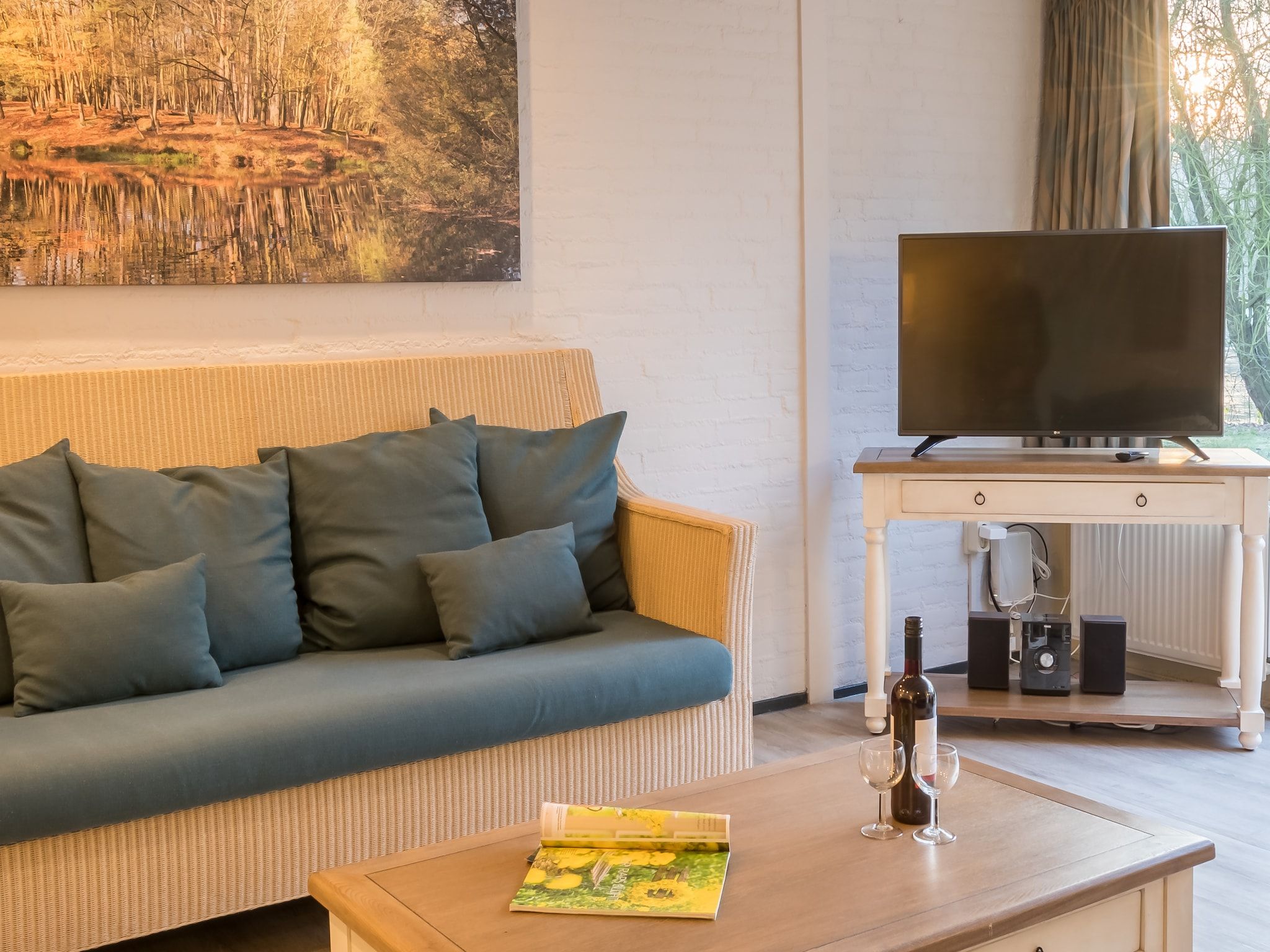 De woonkamer van Vakantiepark Klein Vink 13 in Arcen