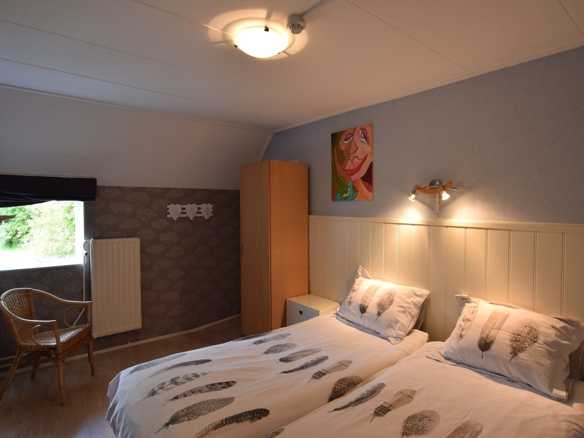 Een slaapkamer van Hoeve Hoogst Tevreden in Leerdam