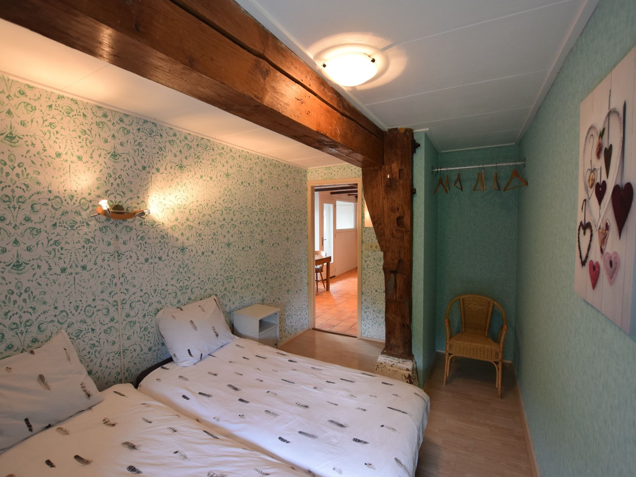 Een slaapkamer van Hoeve Hoogst Tevreden in Leerdam