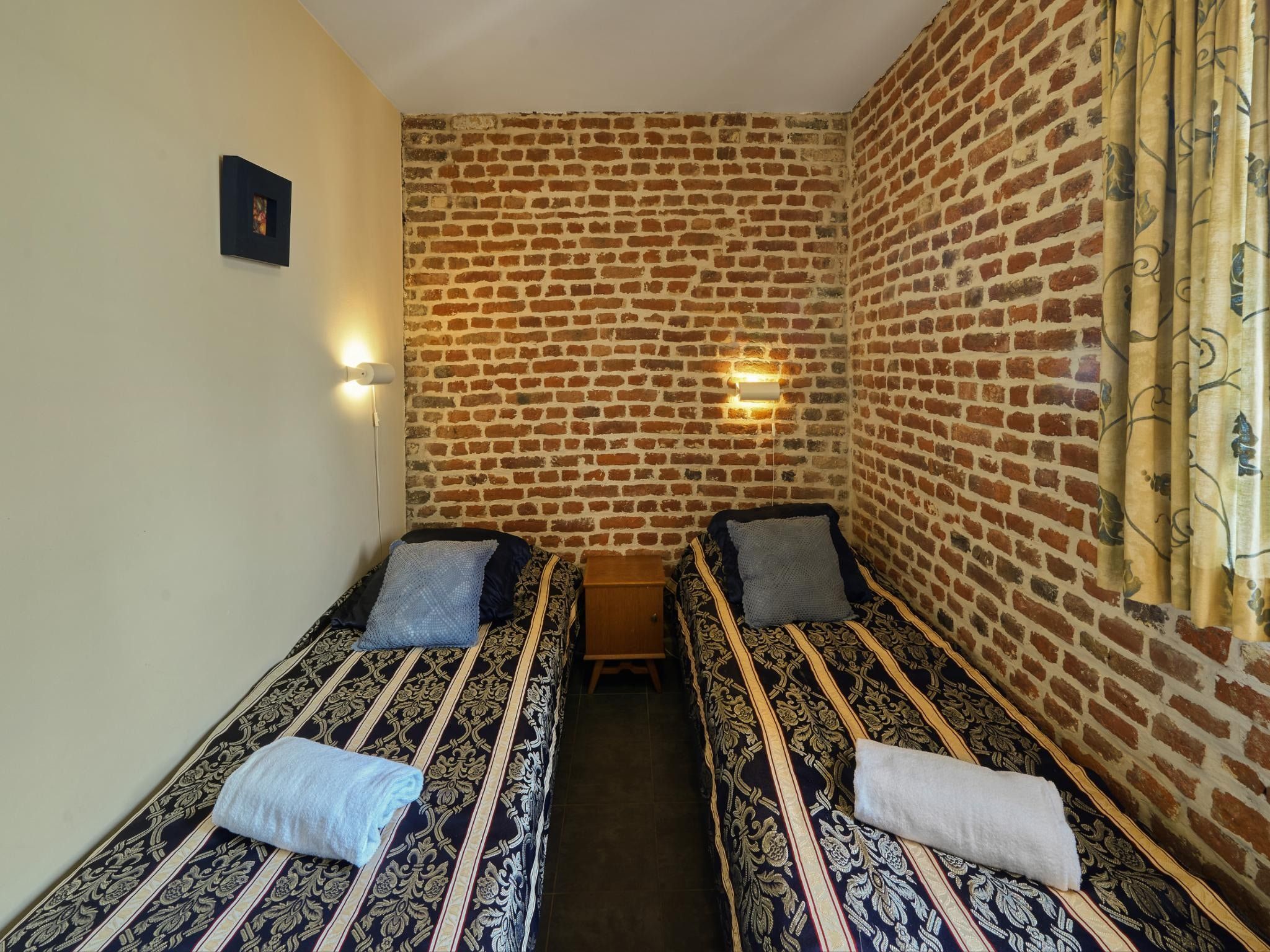 Een slaapkamer van Meschermolen 10 in Mesch-Eijsden