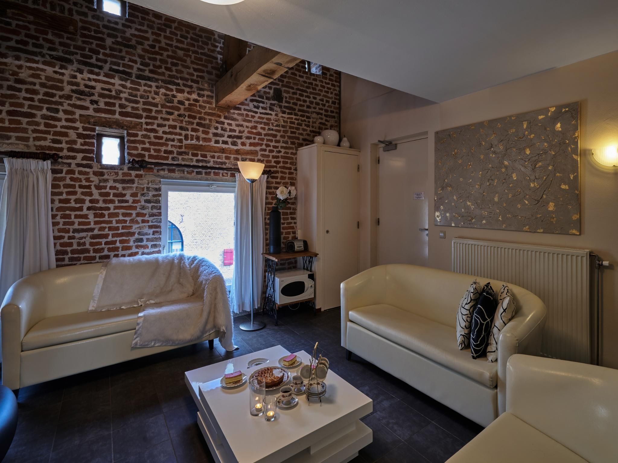 De woonkamer van Meschermolen 10 in Mesch-Eijsden