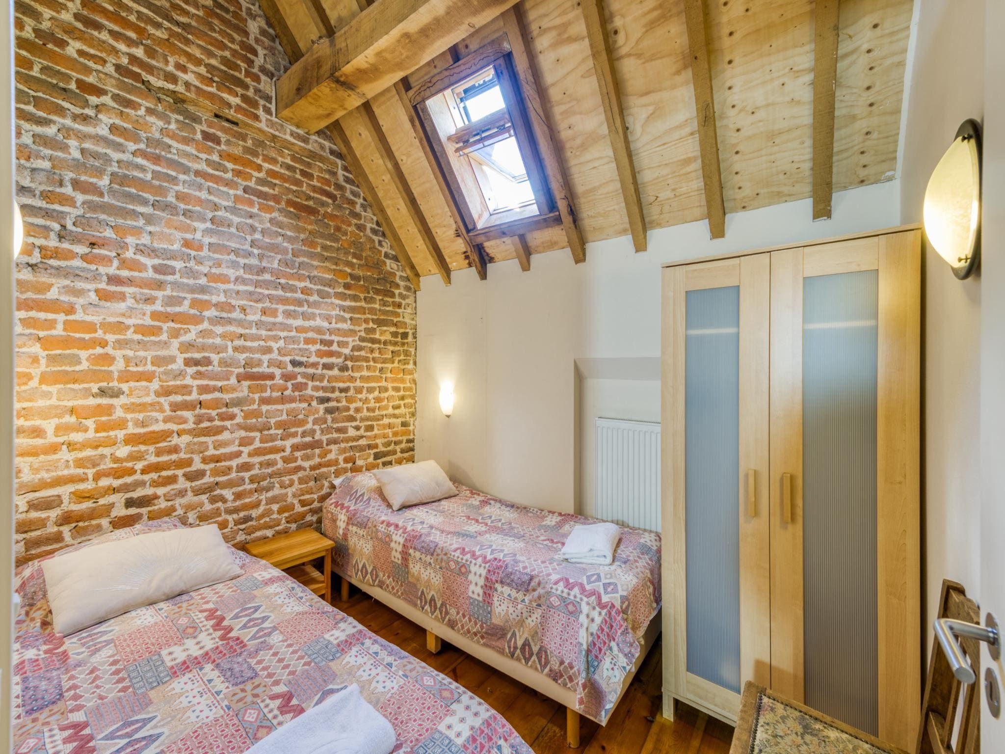 Een slaapkamer van Meschermolen 6 in Mesch-Eijsden