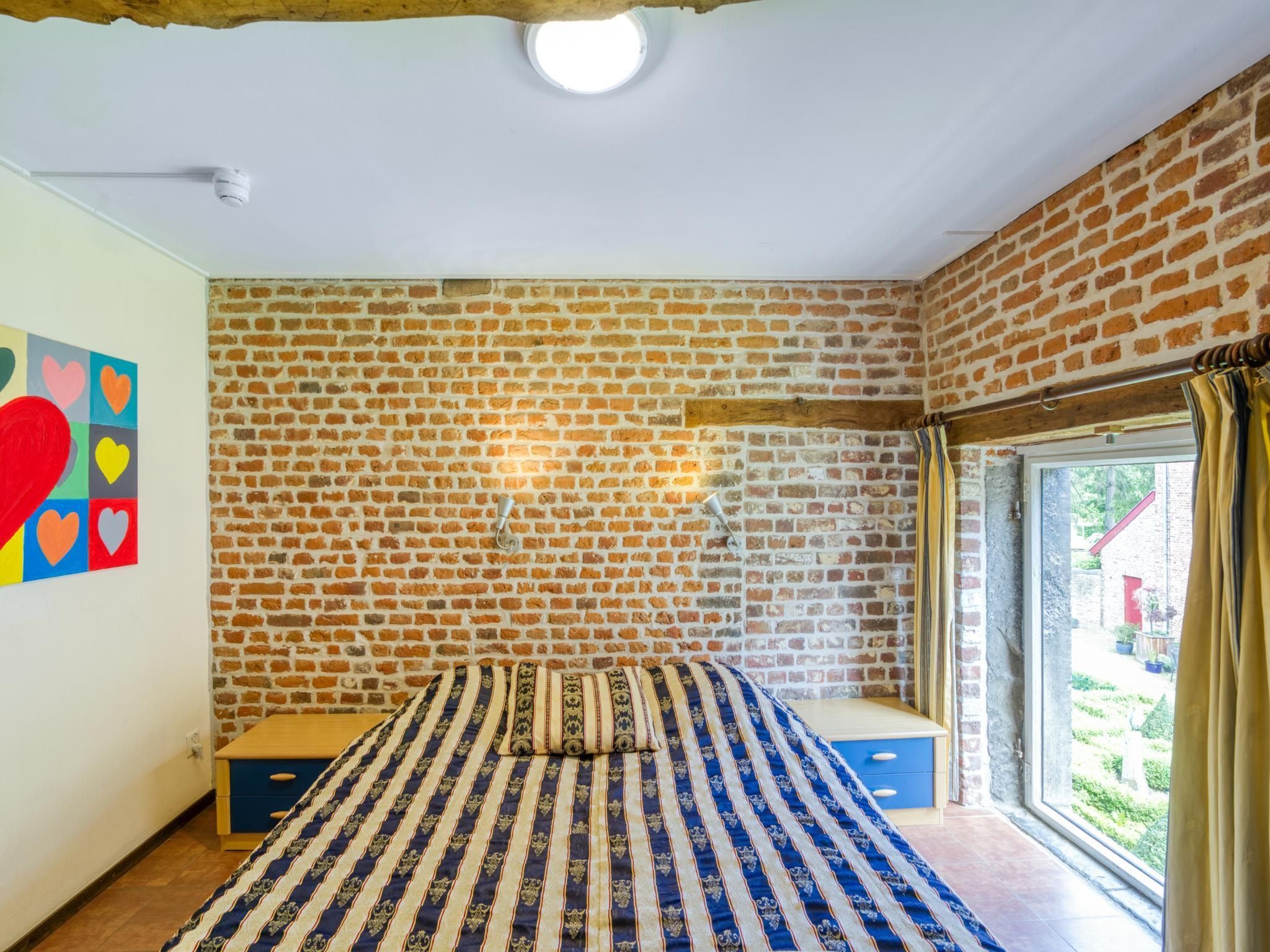 Een slaapkamer van Meschermolen 6 in Mesch-Eijsden