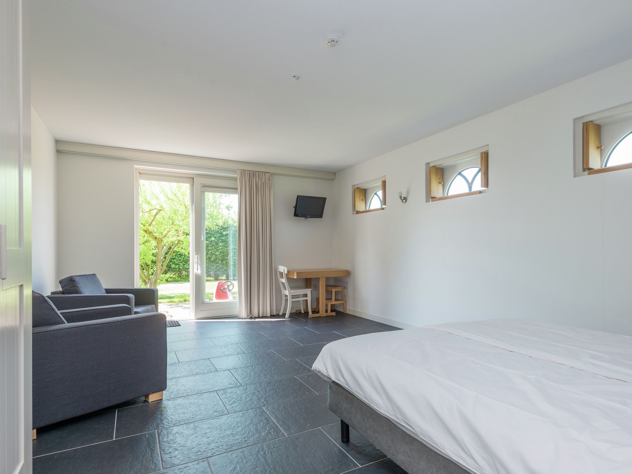 Een slaapkamer van Van Vuure in Zuidoostbeemster