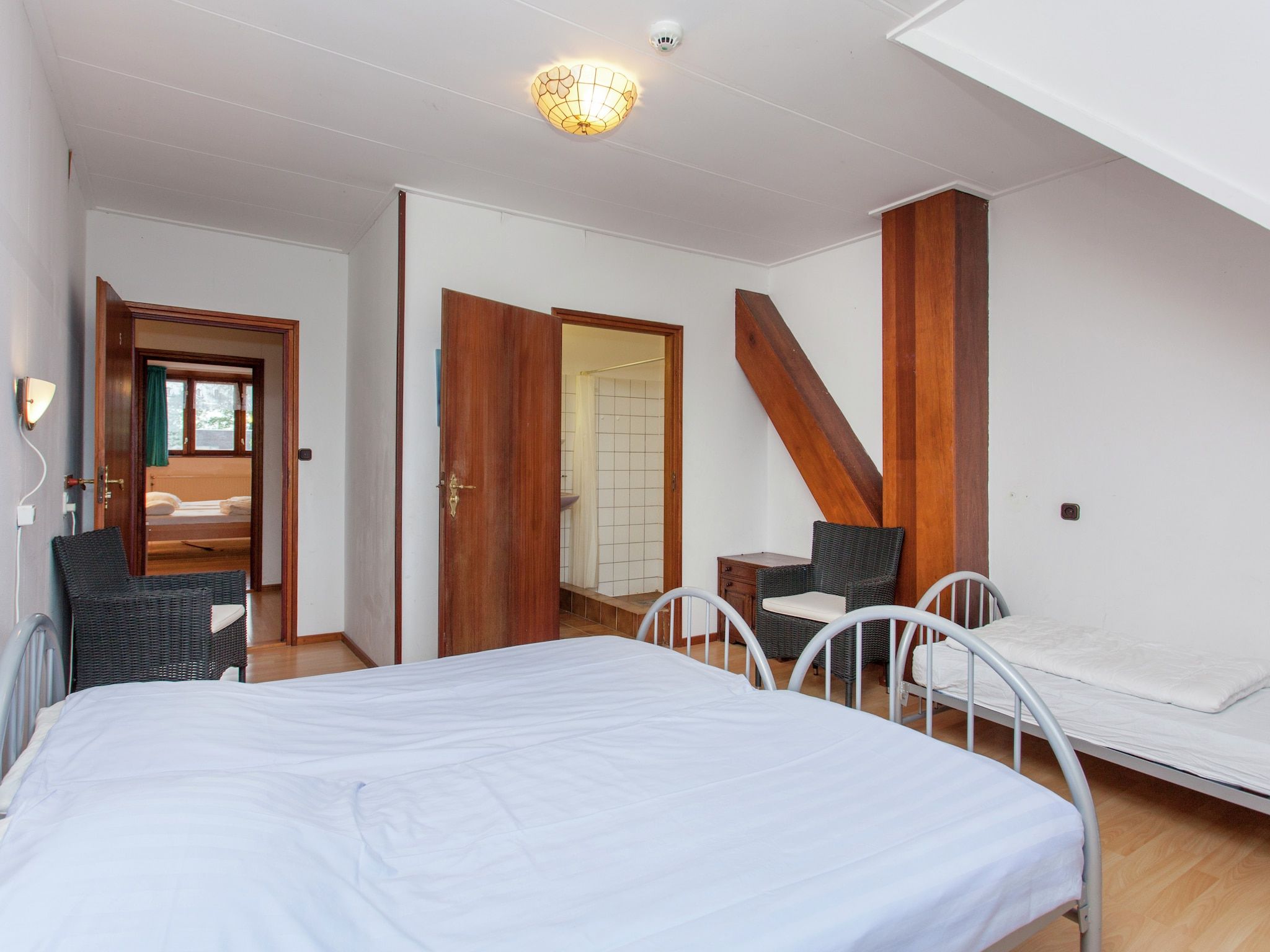 Een slaapkamer van De Vakantie boerderij in Holwerd