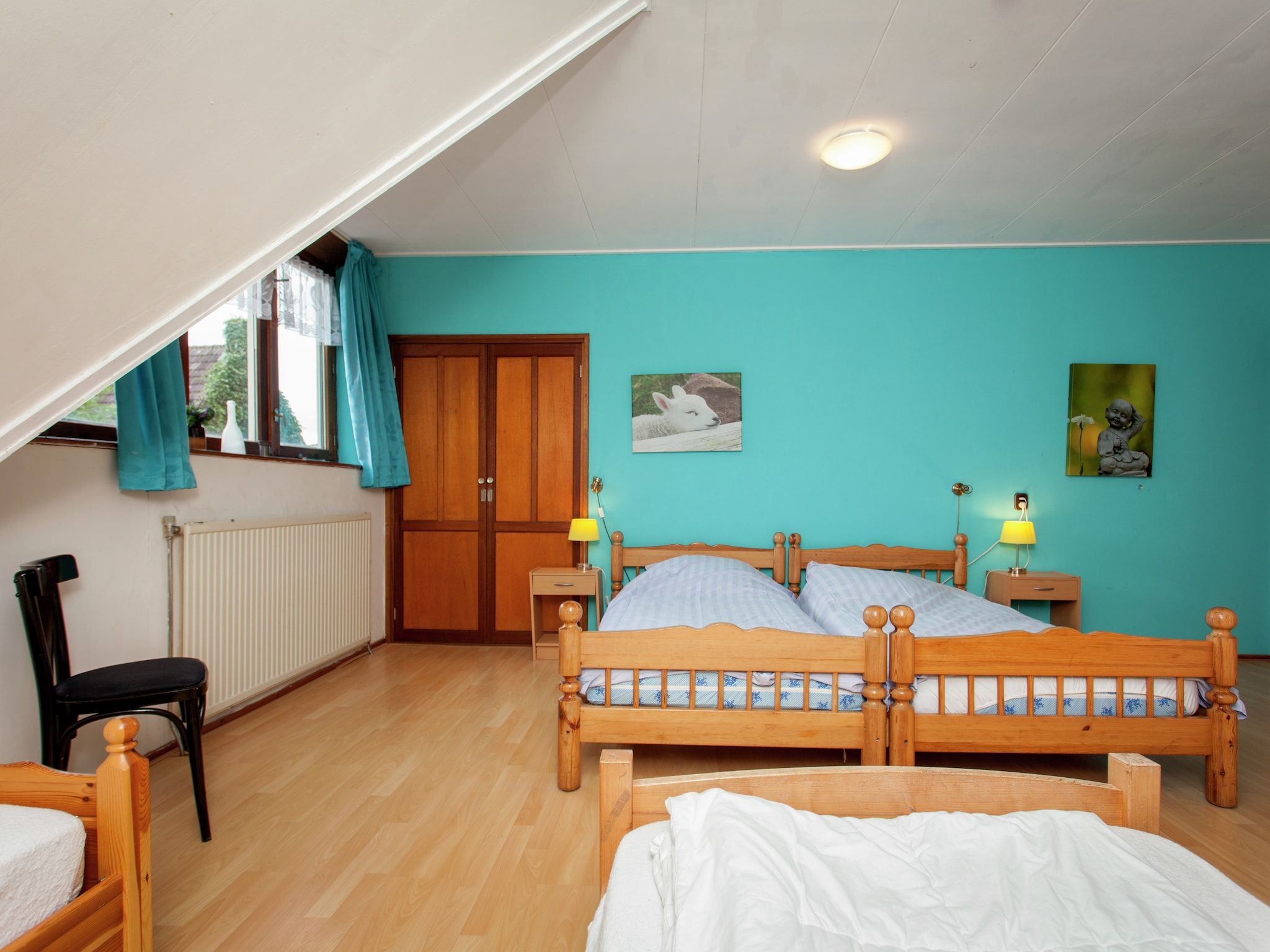 Een slaapkamer van De Vakantie boerderij in Holwerd