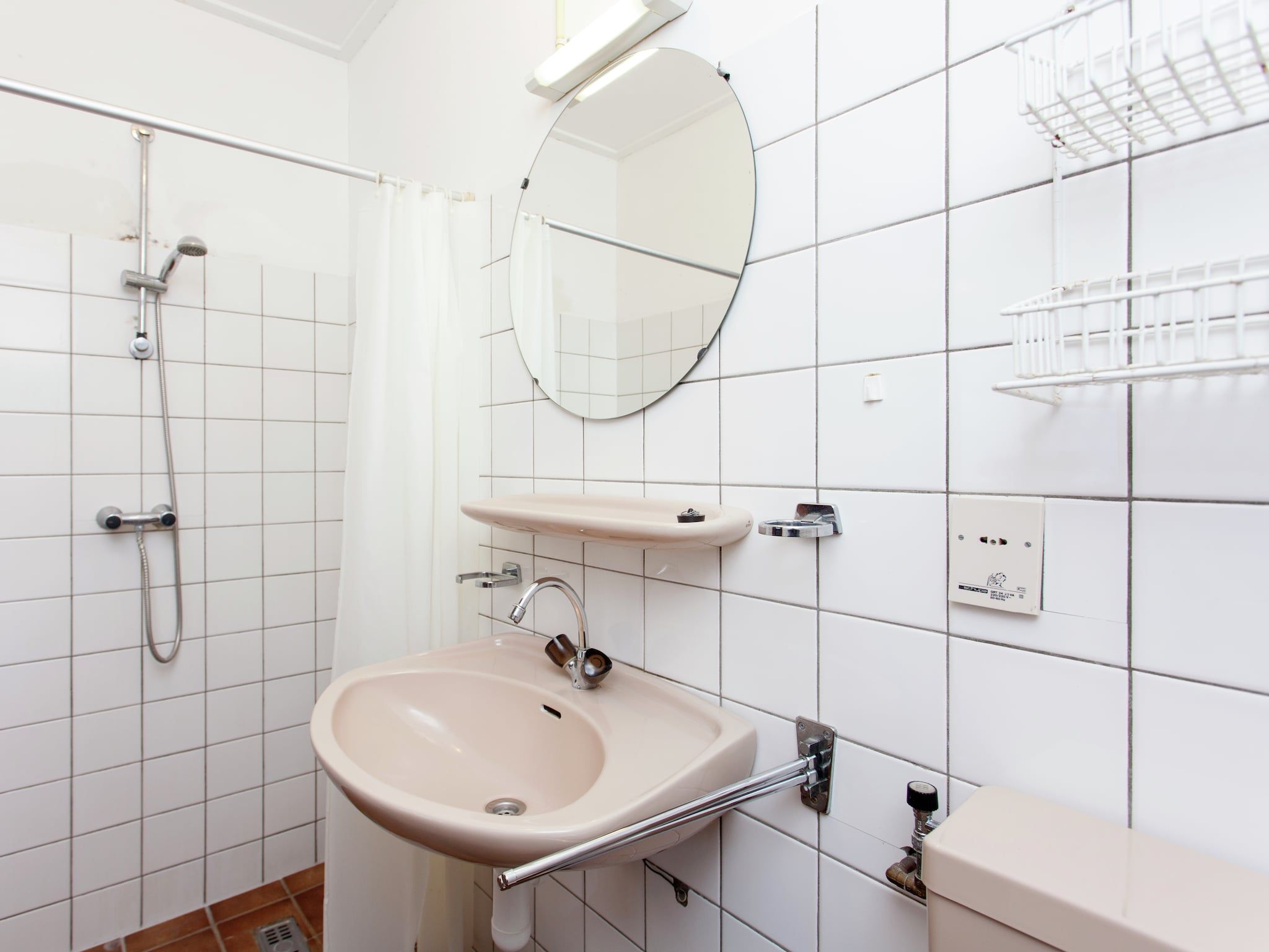 De badkamer van De Vakantie boerderij in Holwerd