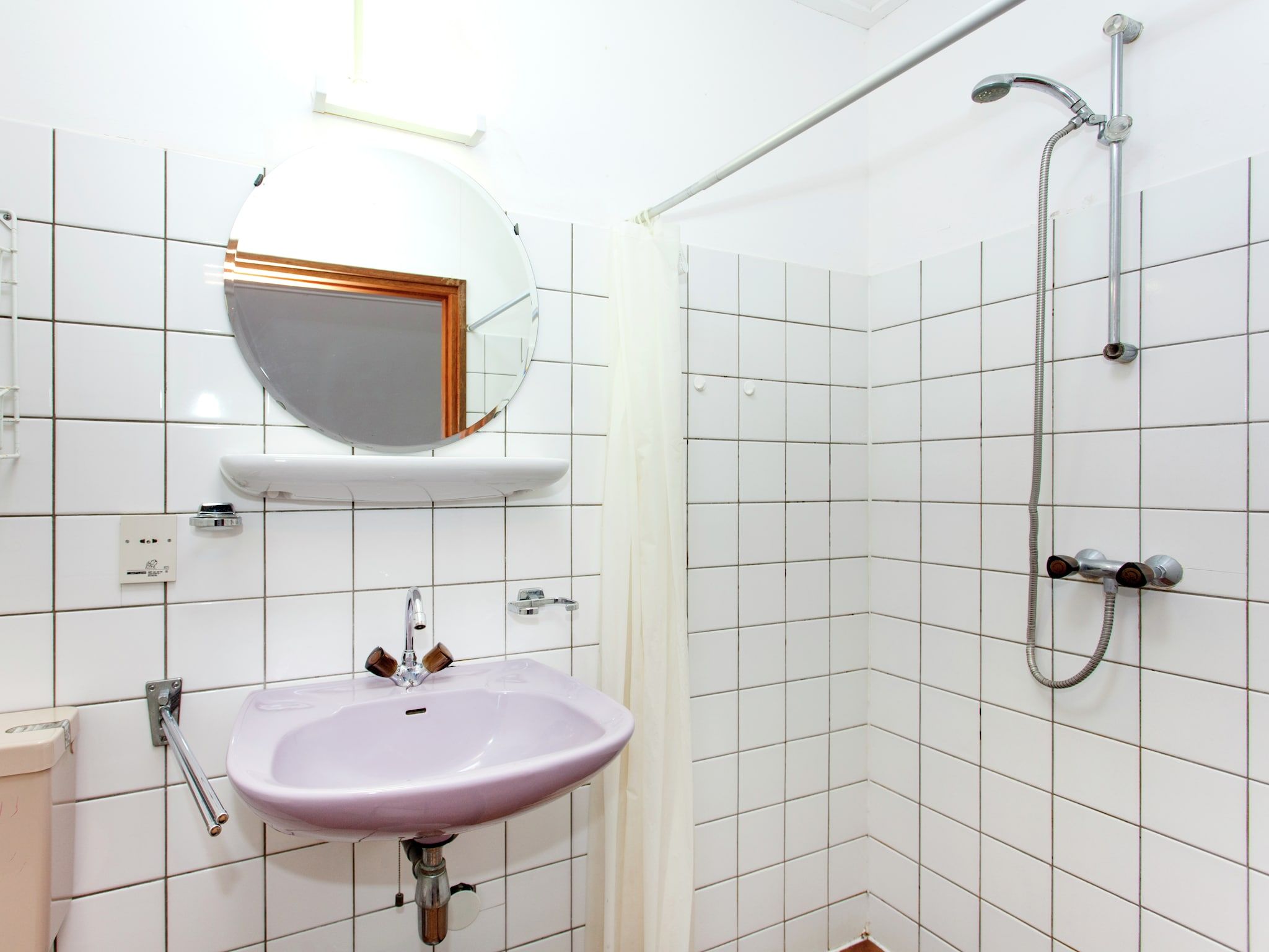 De badkamer van De Vakantie boerderij in Holwerd