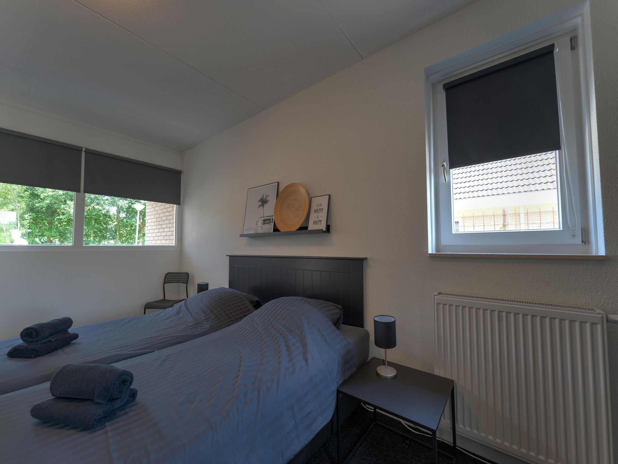 Een slaapkamer van Buitenplaats Enjoy in Zeewolde