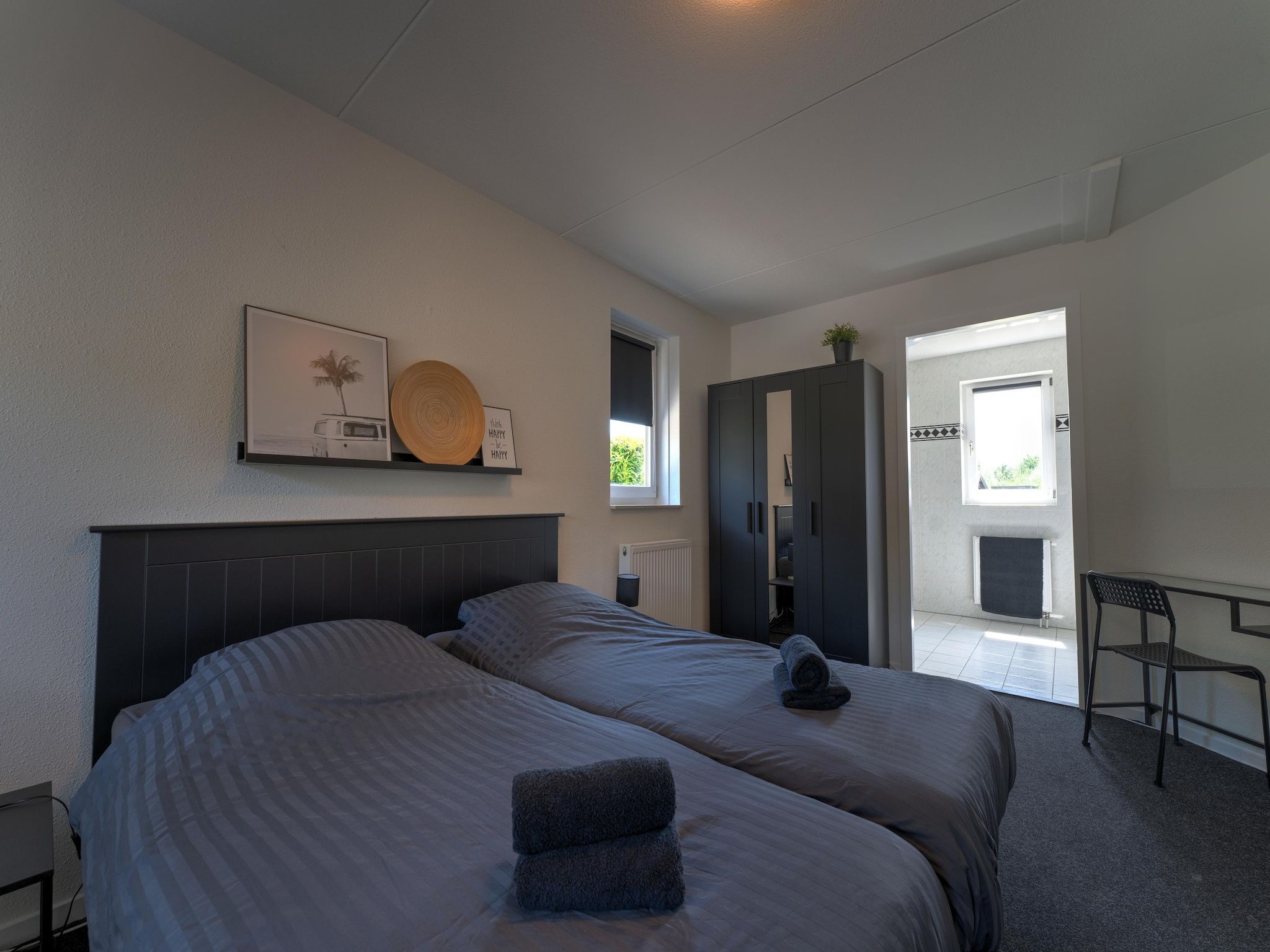 Een slaapkamer van Buitenplaats Enjoy in Zeewolde