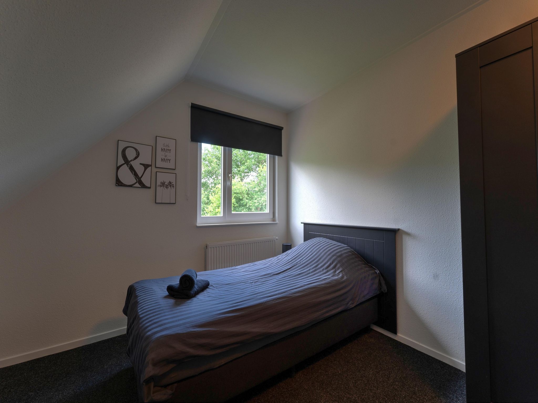 Een slaapkamer van Buitenplaats Enjoy in Zeewolde