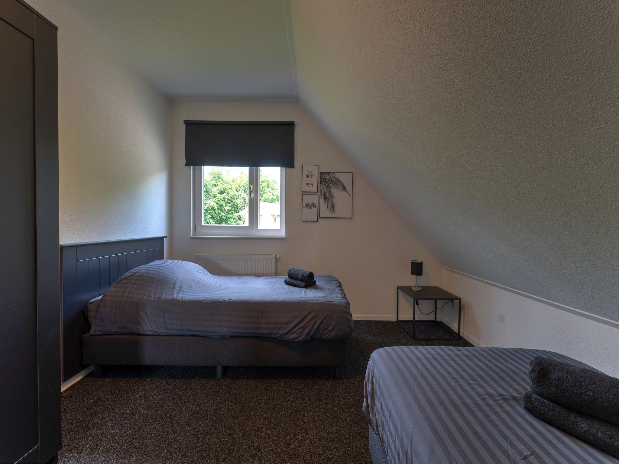 Een slaapkamer van Buitenplaats Enjoy in Zeewolde