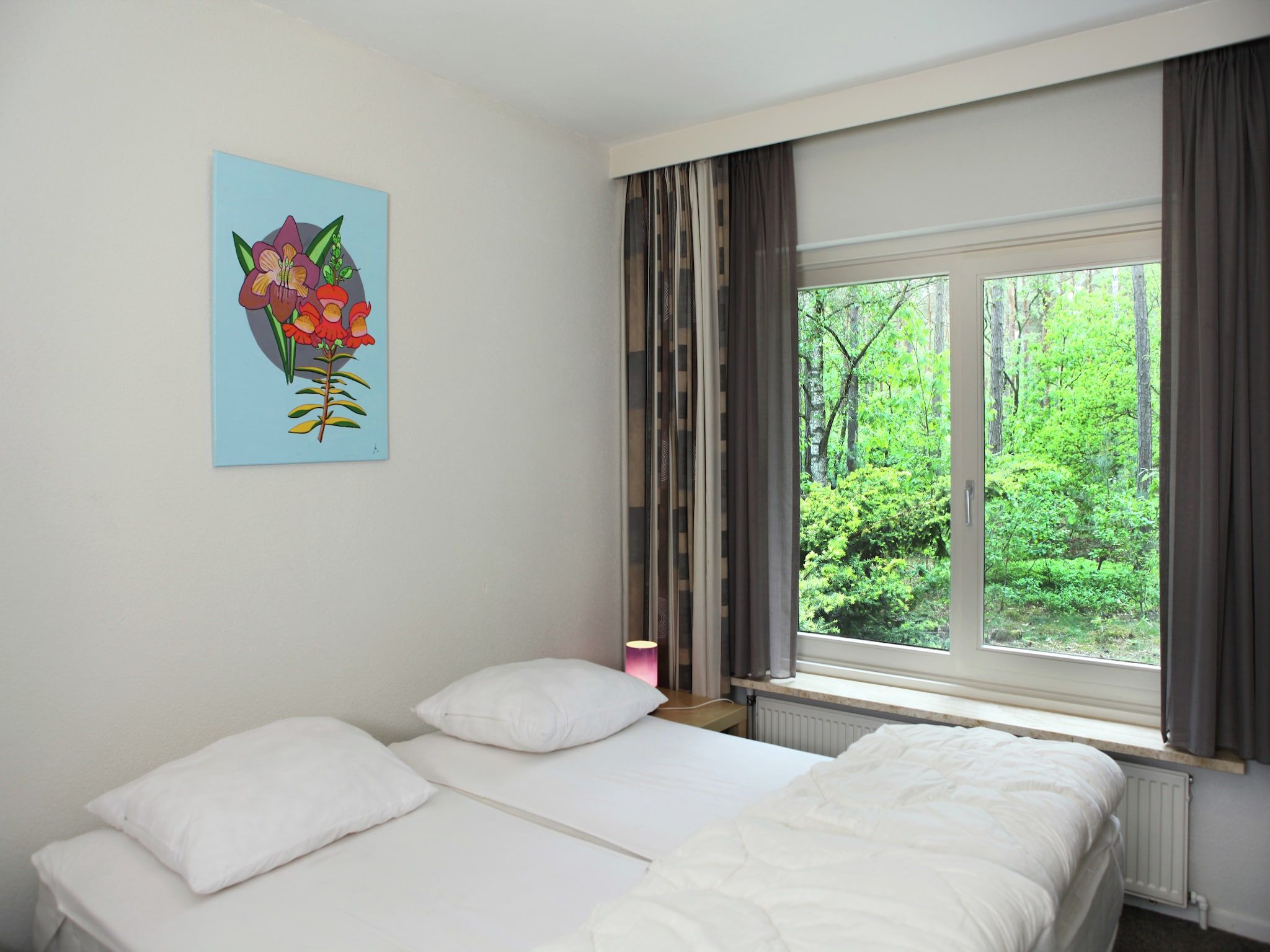 Een slaapkamer van De grove den in Doornspijk