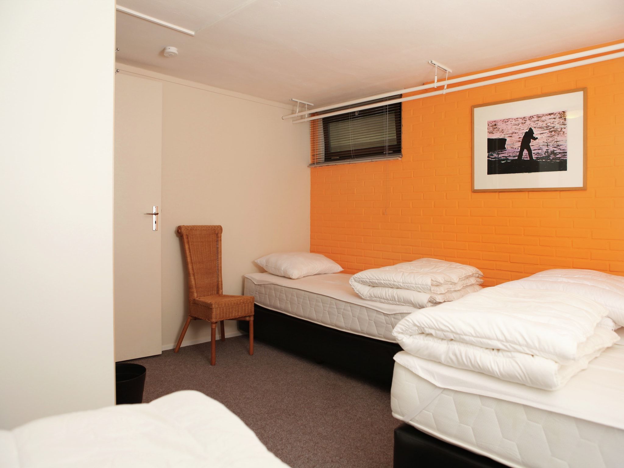 Een slaapkamer van De grove den in Doornspijk