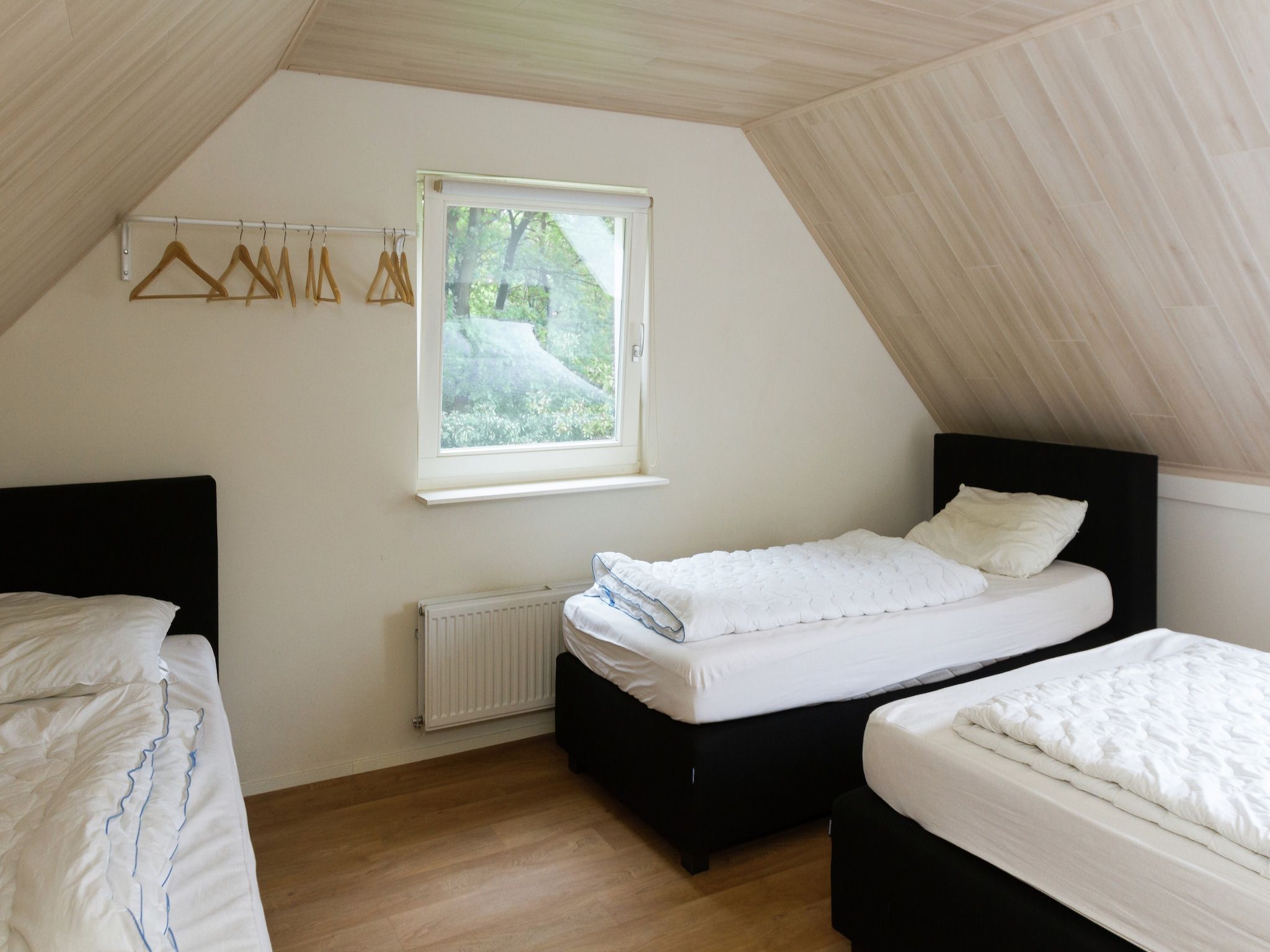 Een slaapkamer van de Lansert in Vessem