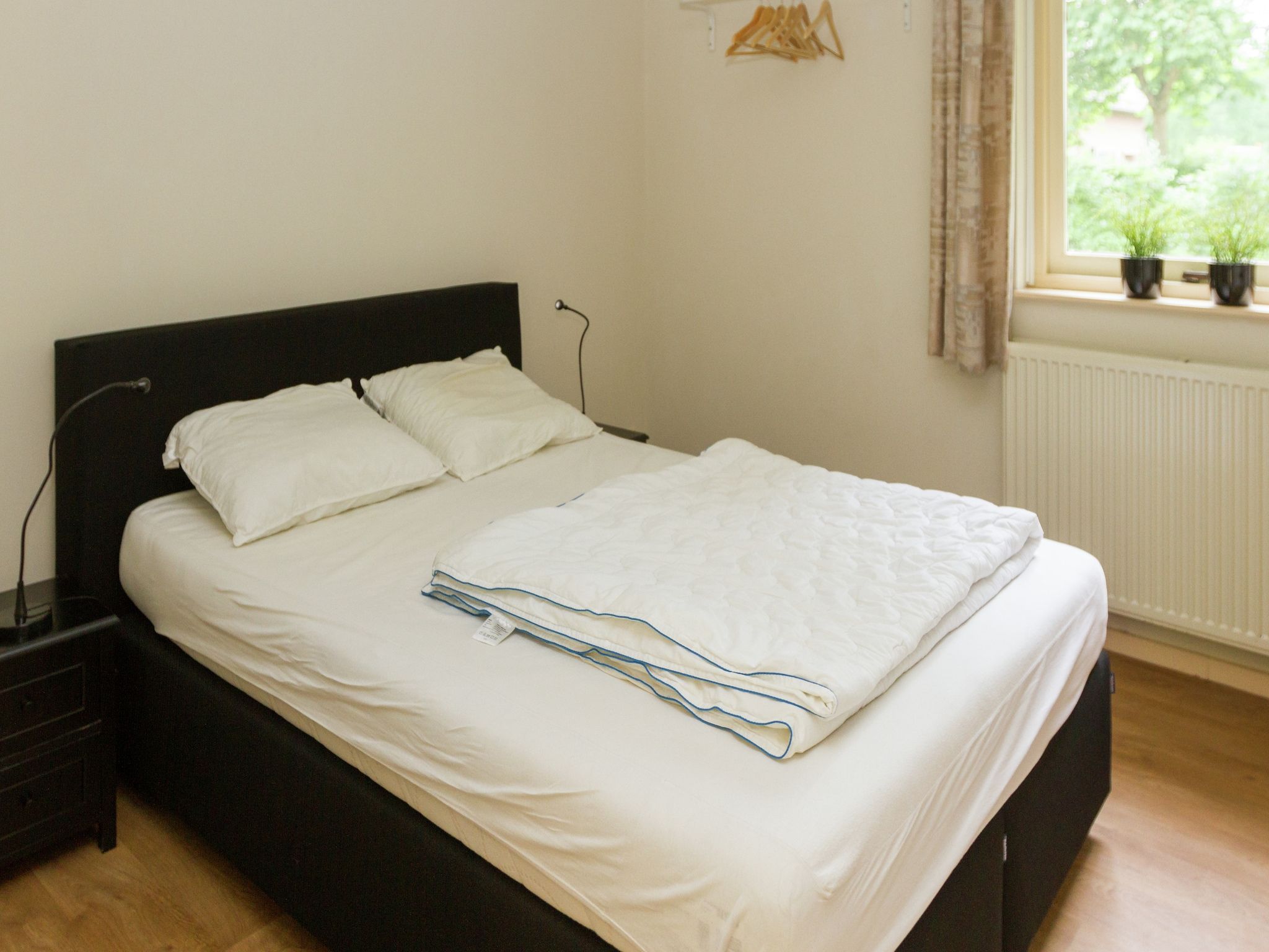 Een slaapkamer van de Lansert in Vessem