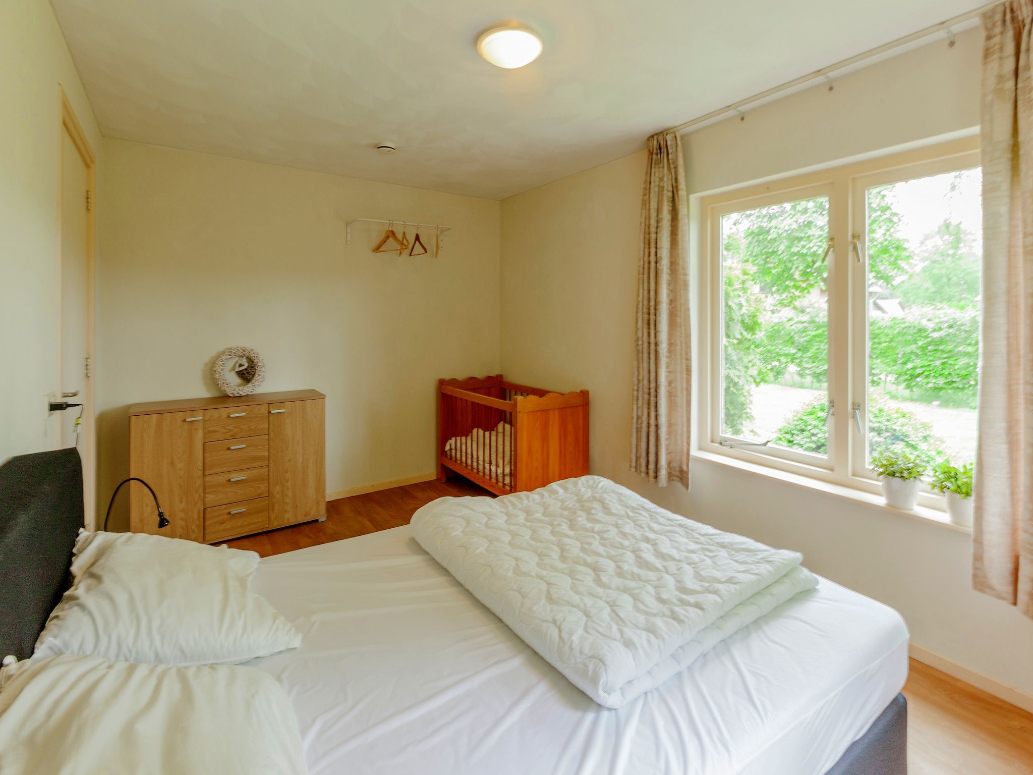 Een slaapkamer van de Lansert in Vessem