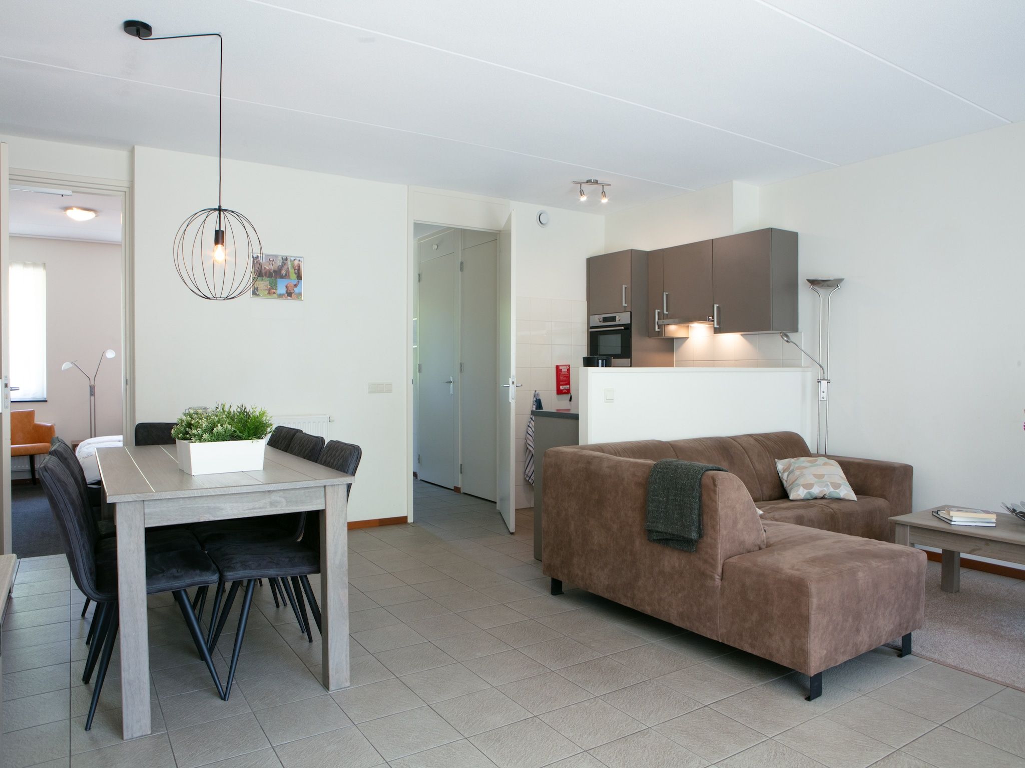 De woonkamer van Vakantiepark Horsetellerie 7 in Hardenberg (rheezerveen)