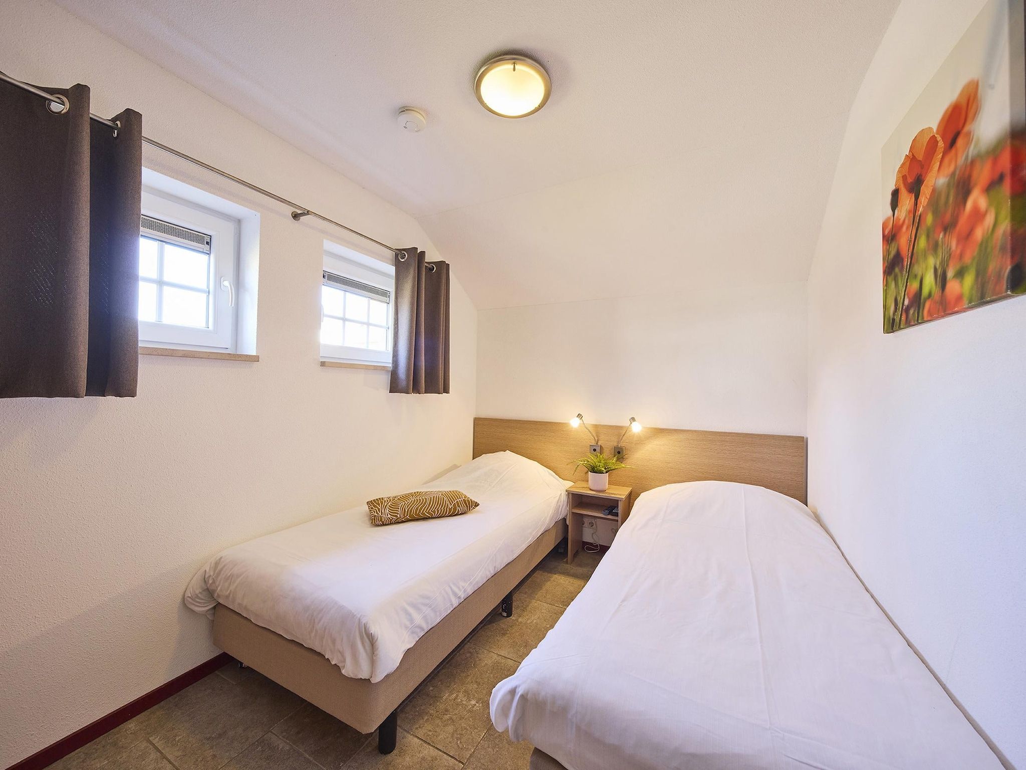 Een slaapkamer van Buitenhof De Leistert 4 in Roggel