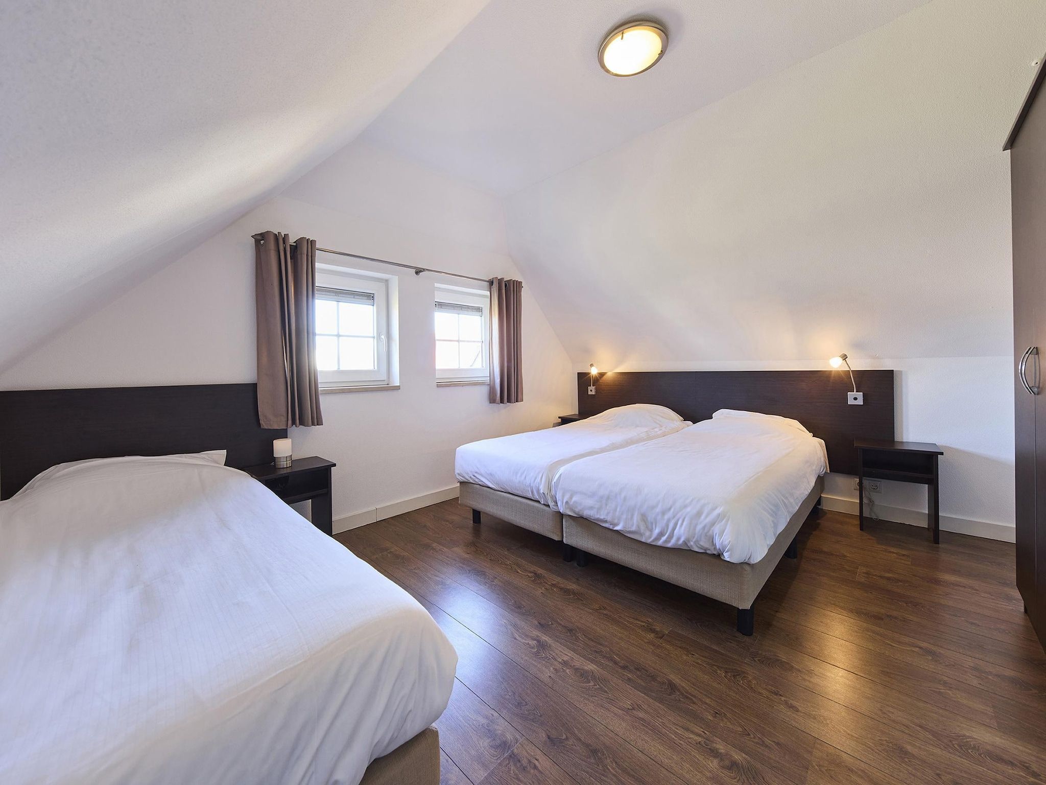 Een slaapkamer van Buitenhof De Leistert 7 in Roggel