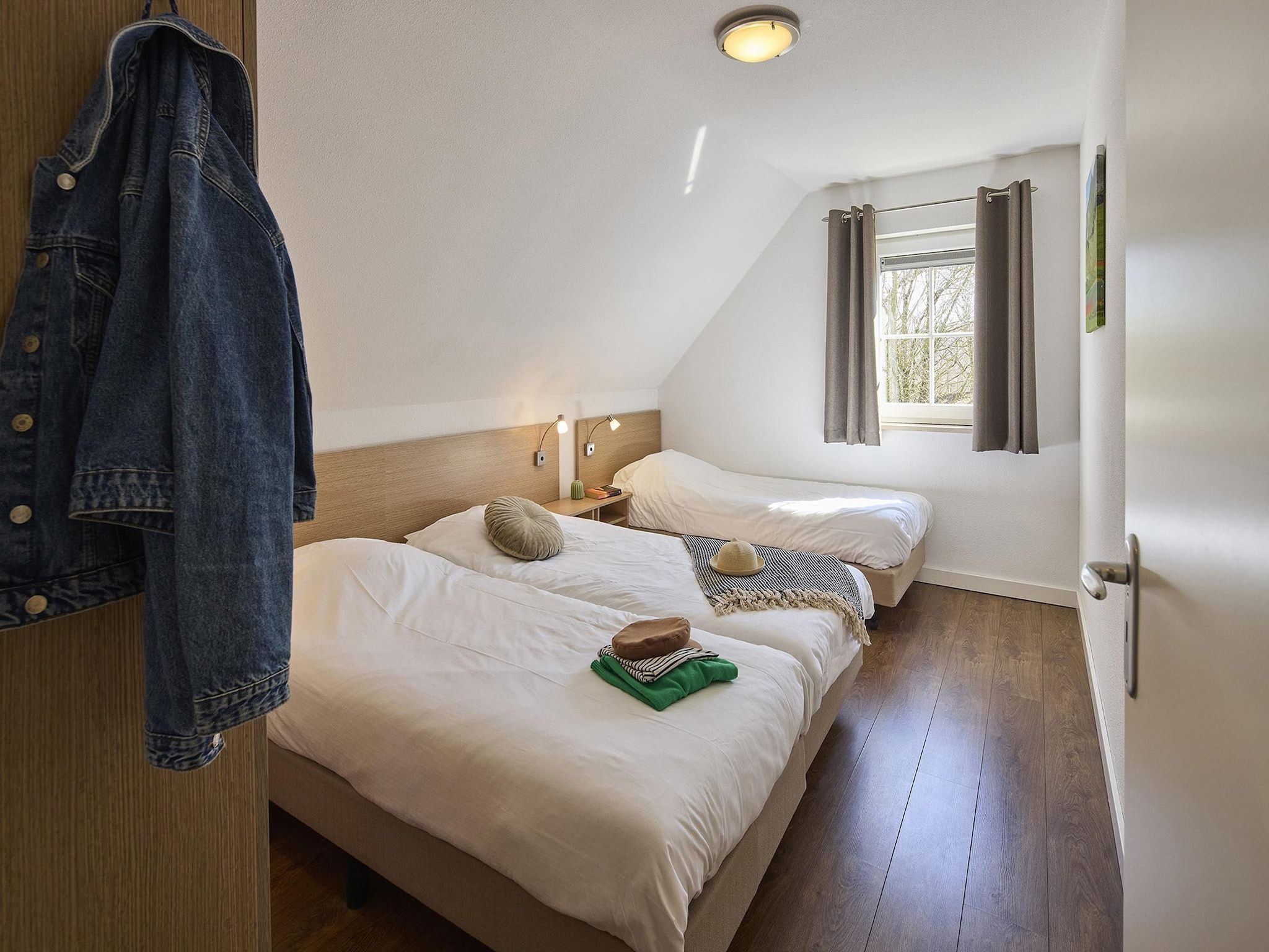 Een slaapkamer van Buitenhof De Leistert 12 in Roggel