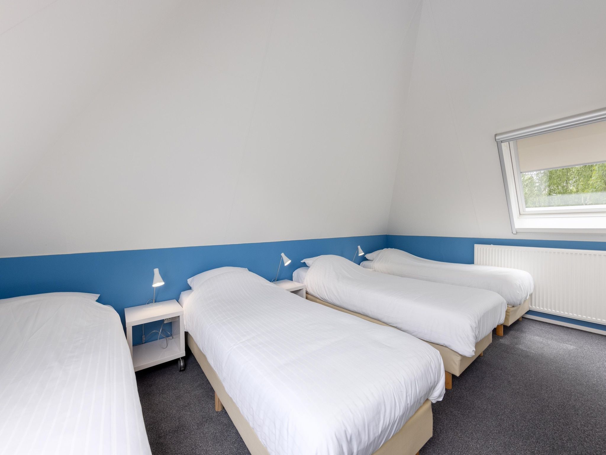 Een slaapkamer van Buitenplaats It Wiid 5 in Eernewoud