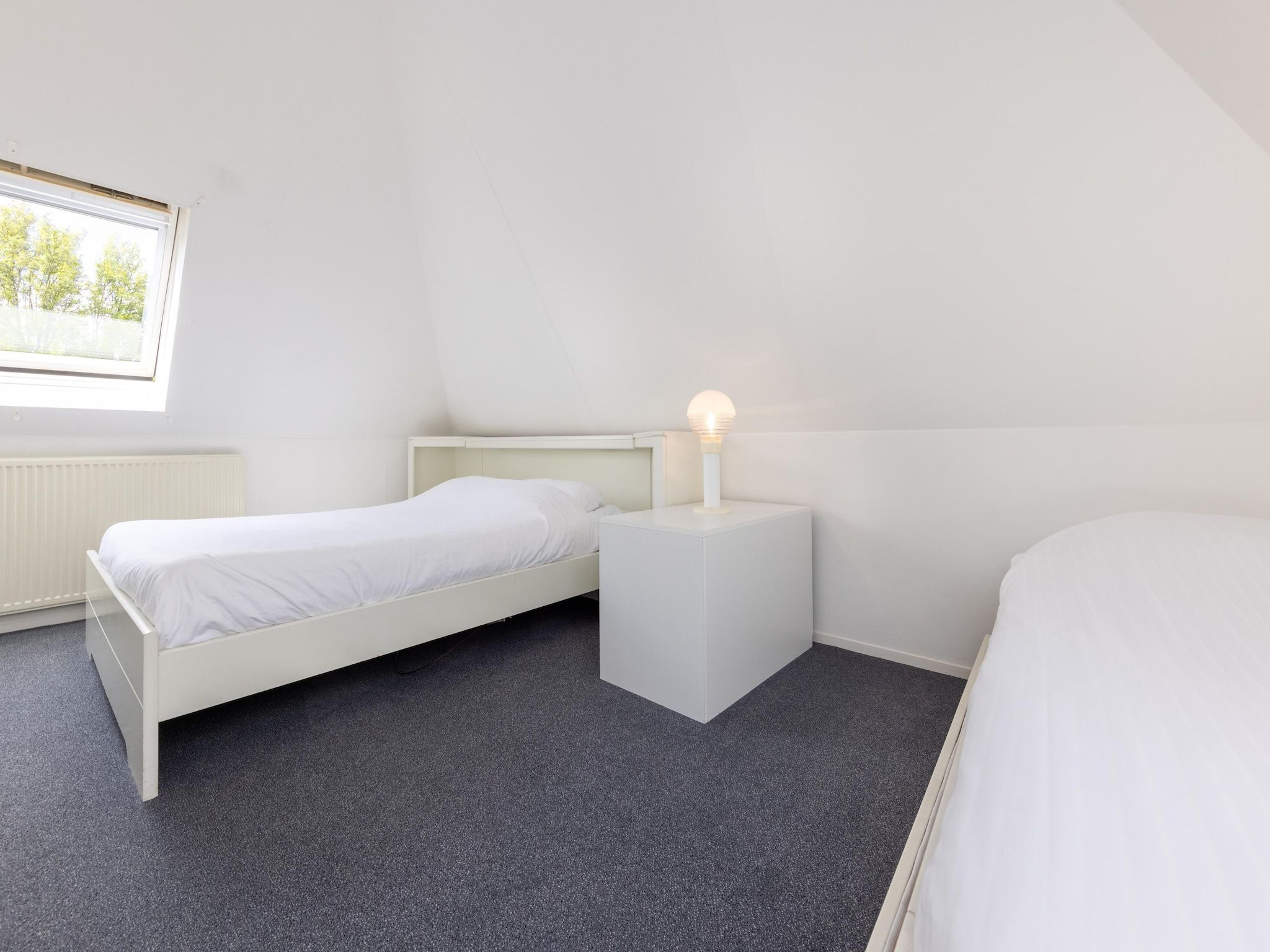 Een slaapkamer van Buitenplaats It Wiid 4 in Eernewoud