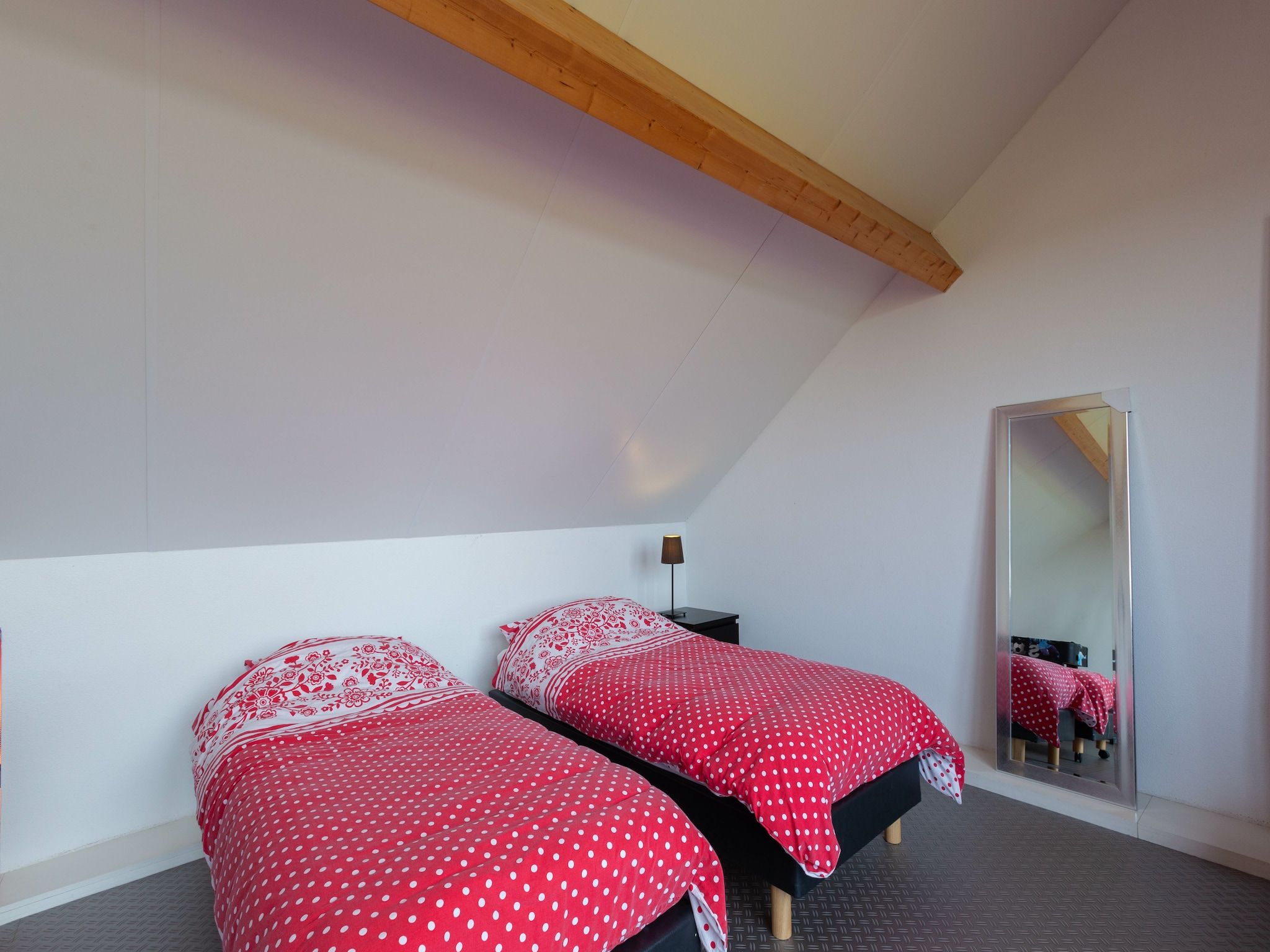 Een slaapkamer van Lyts Sypenstien in Langweer