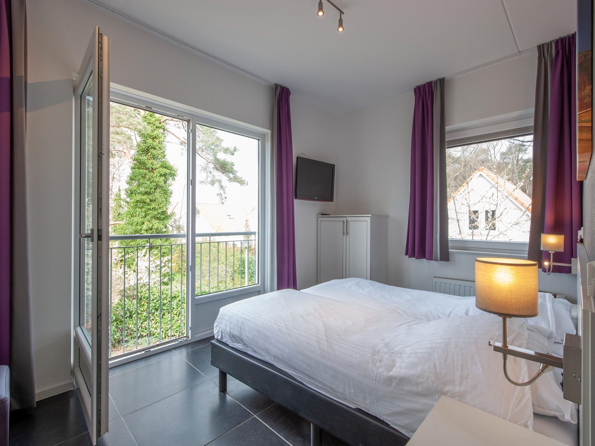 Een slaapkamer van Resort Arcen 5 in Arcen