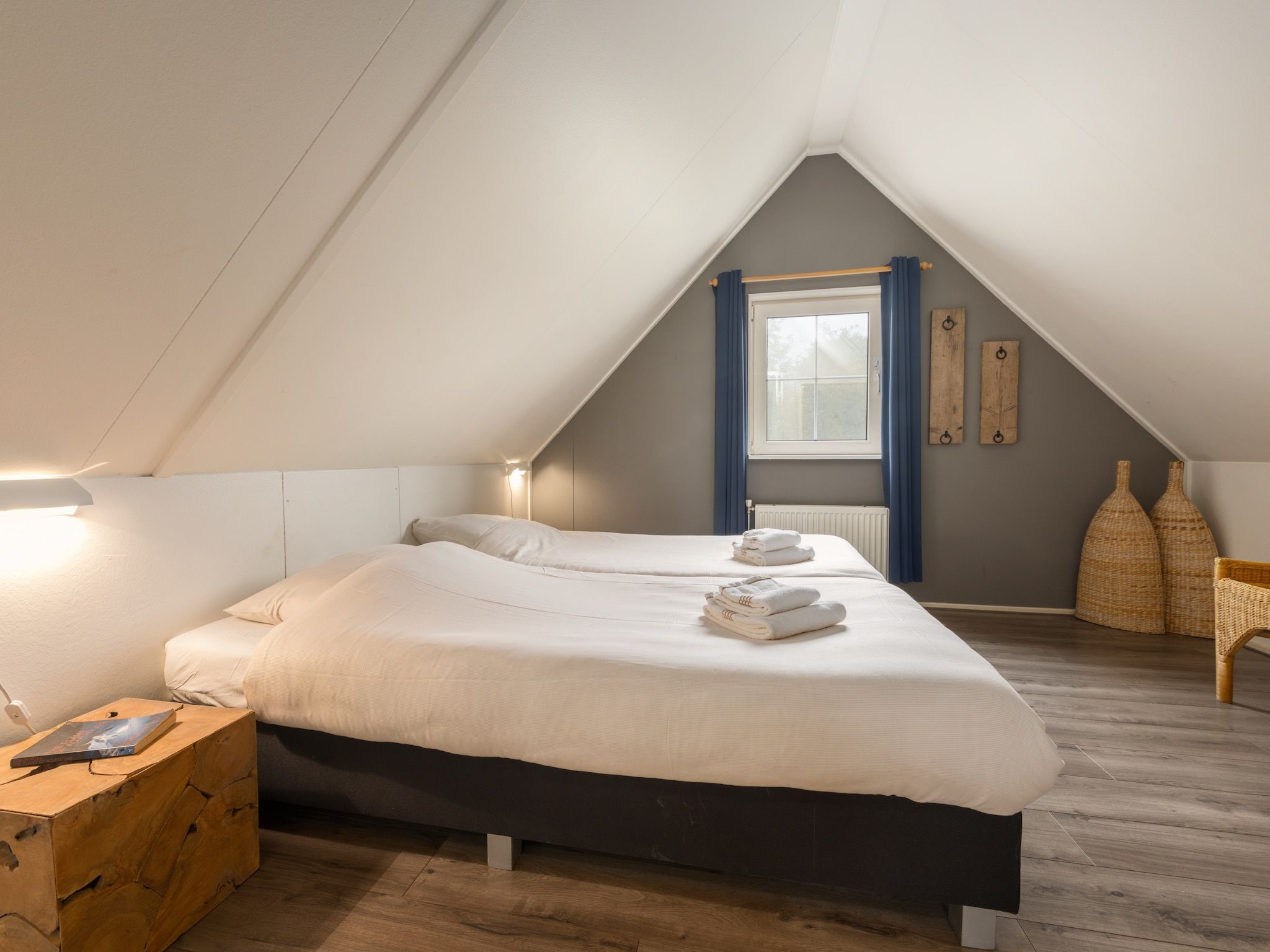 Een slaapkamer van Villapark De Weerribben 3 in Paasloo