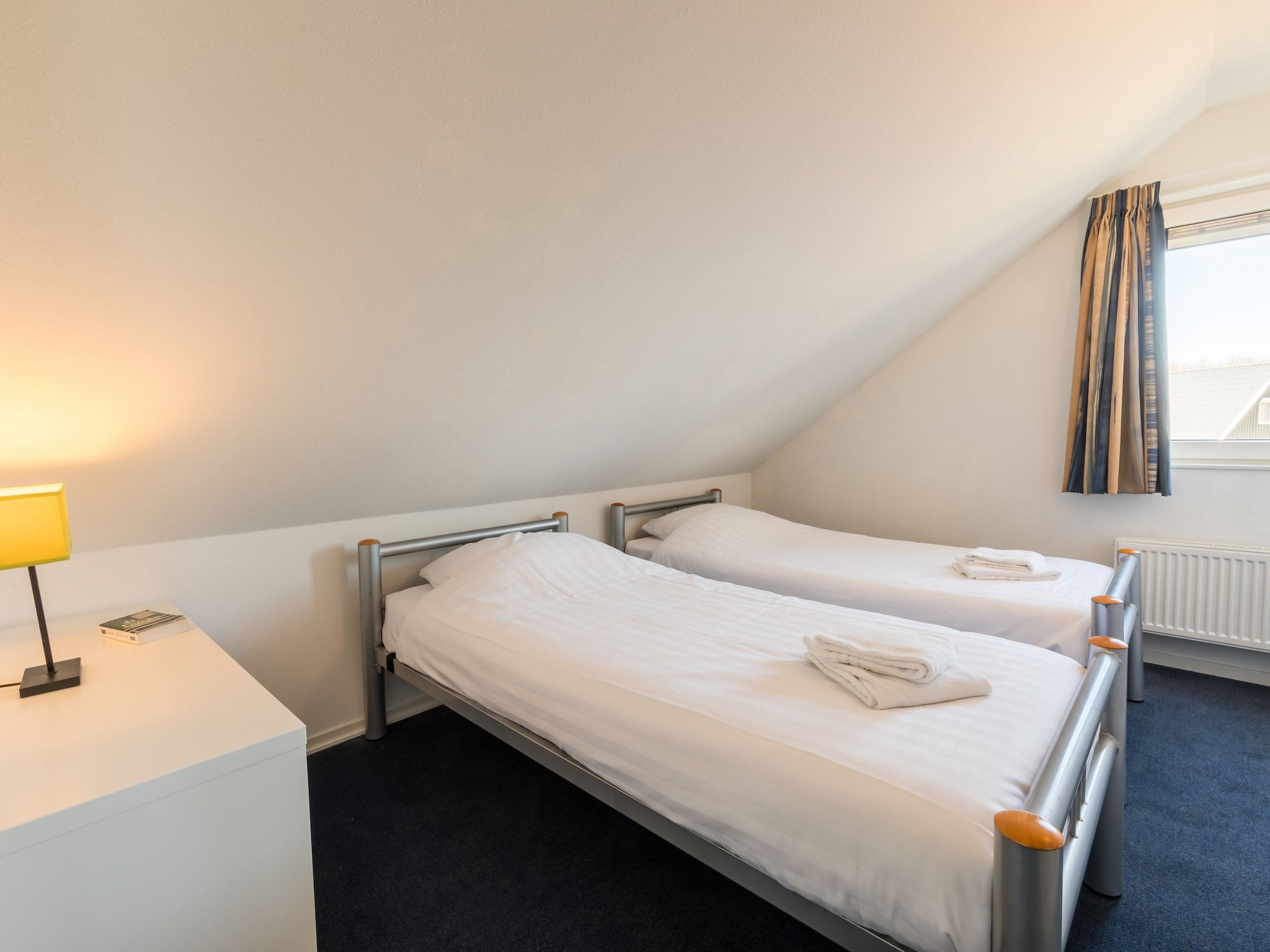 Een slaapkamer van Hunzepark 2 in Gasselternijveen