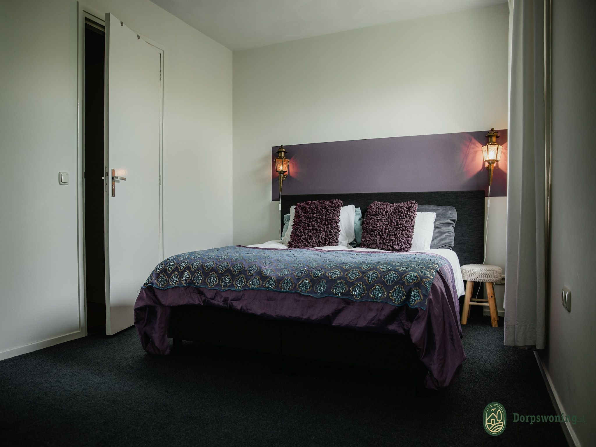 Een slaapkamer van Dorpswoning Het Landelijke in Leende