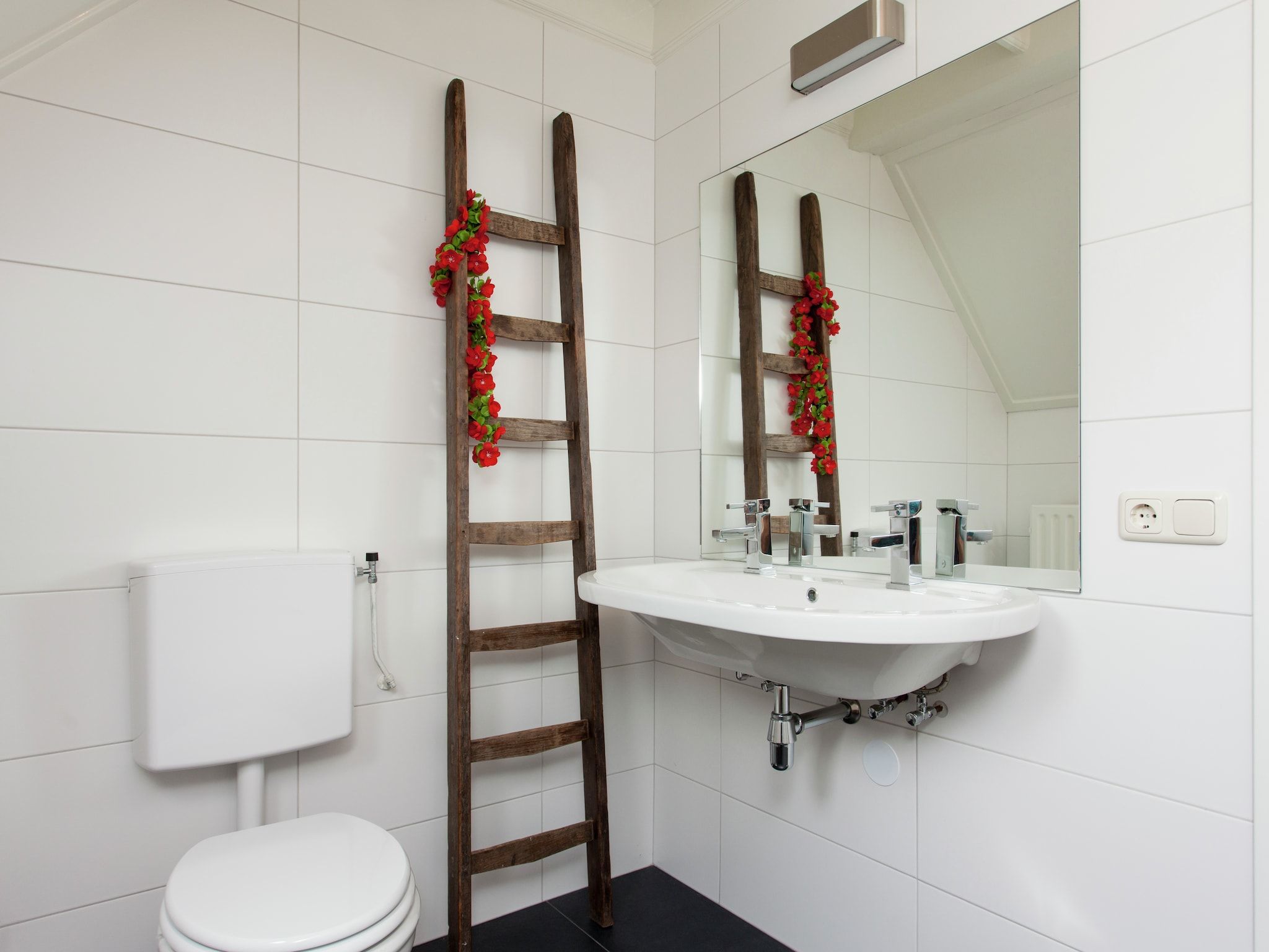 De badkamer van Dorpswoning De Plek in Leende