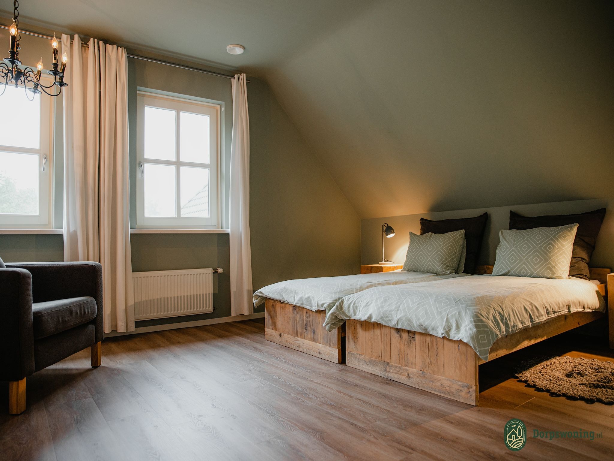 Een slaapkamer van Dorpswoning Het Uitzicht in Leende