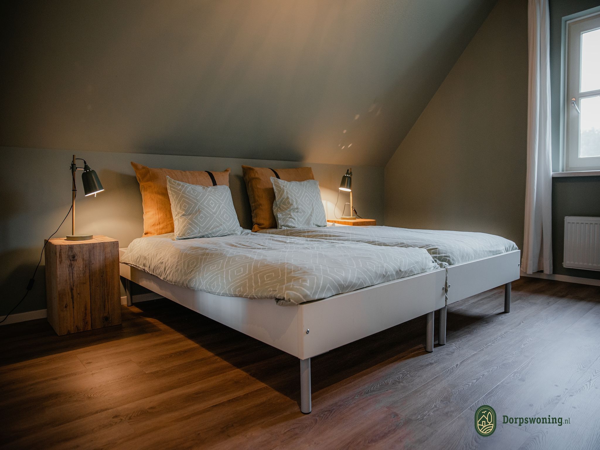 Een slaapkamer van Dorpswoning Het Uitzicht in Leende