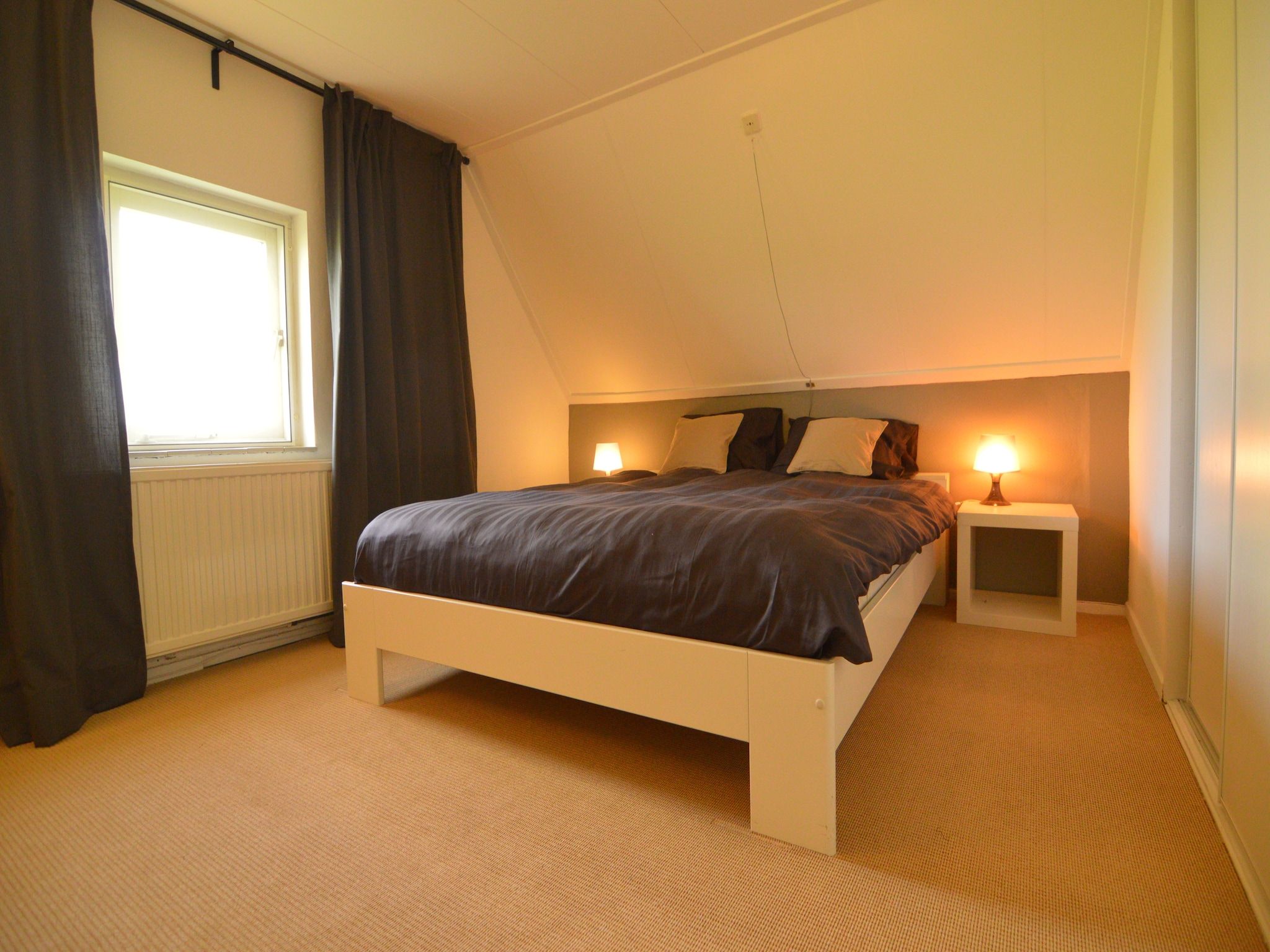 Een slaapkamer van Robertushoeve in Dalfsen