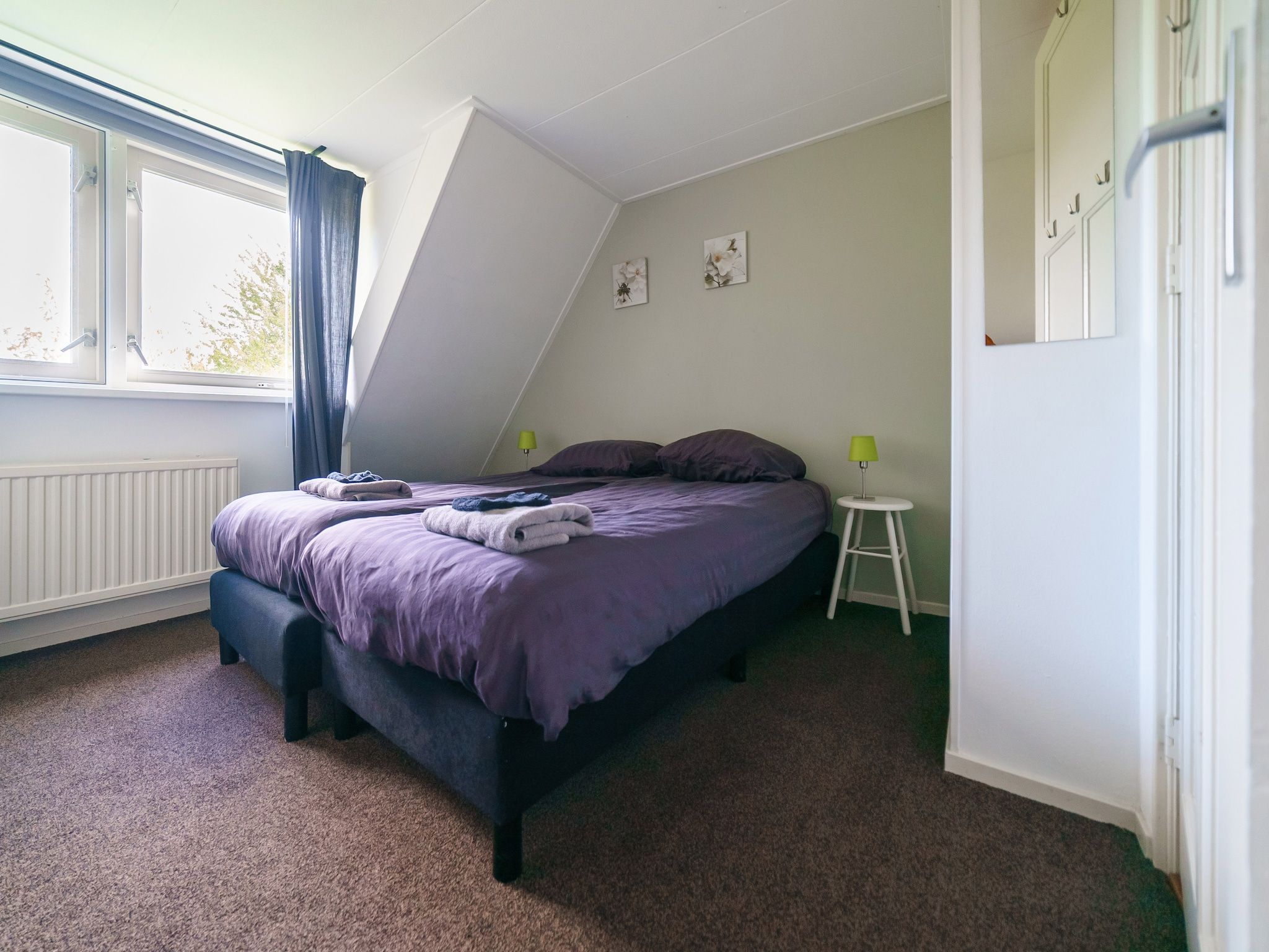 Een slaapkamer van Robertushoeve in Dalfsen