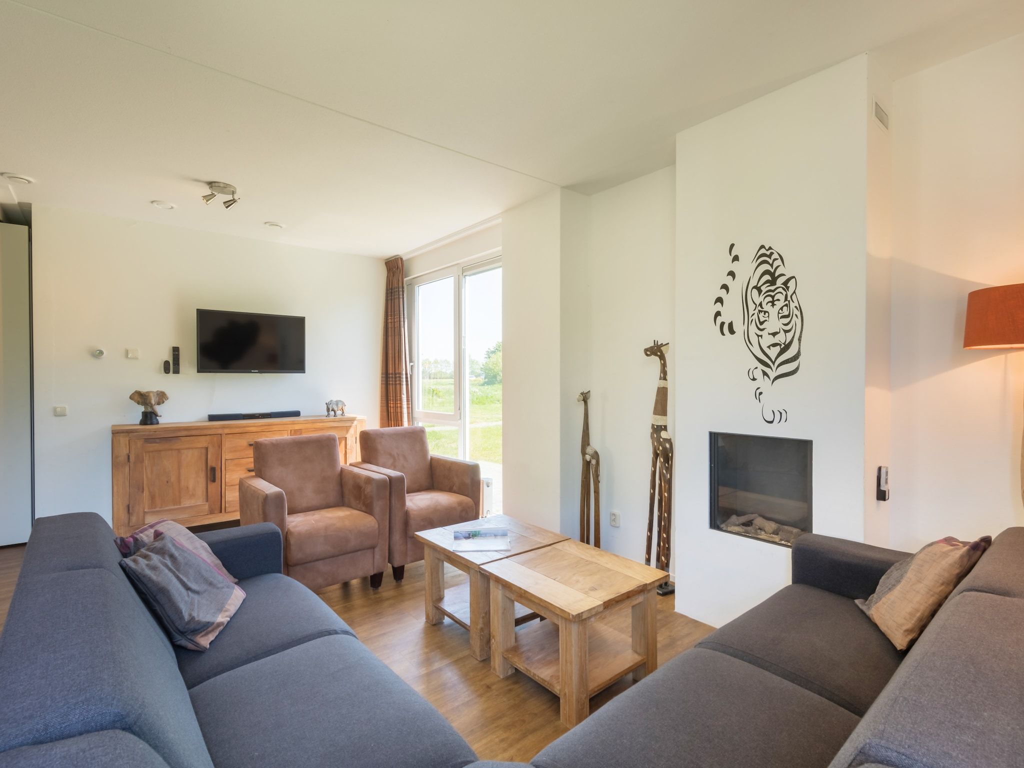 De woonkamer van Résidence de Weerribben 2 in Paasloo