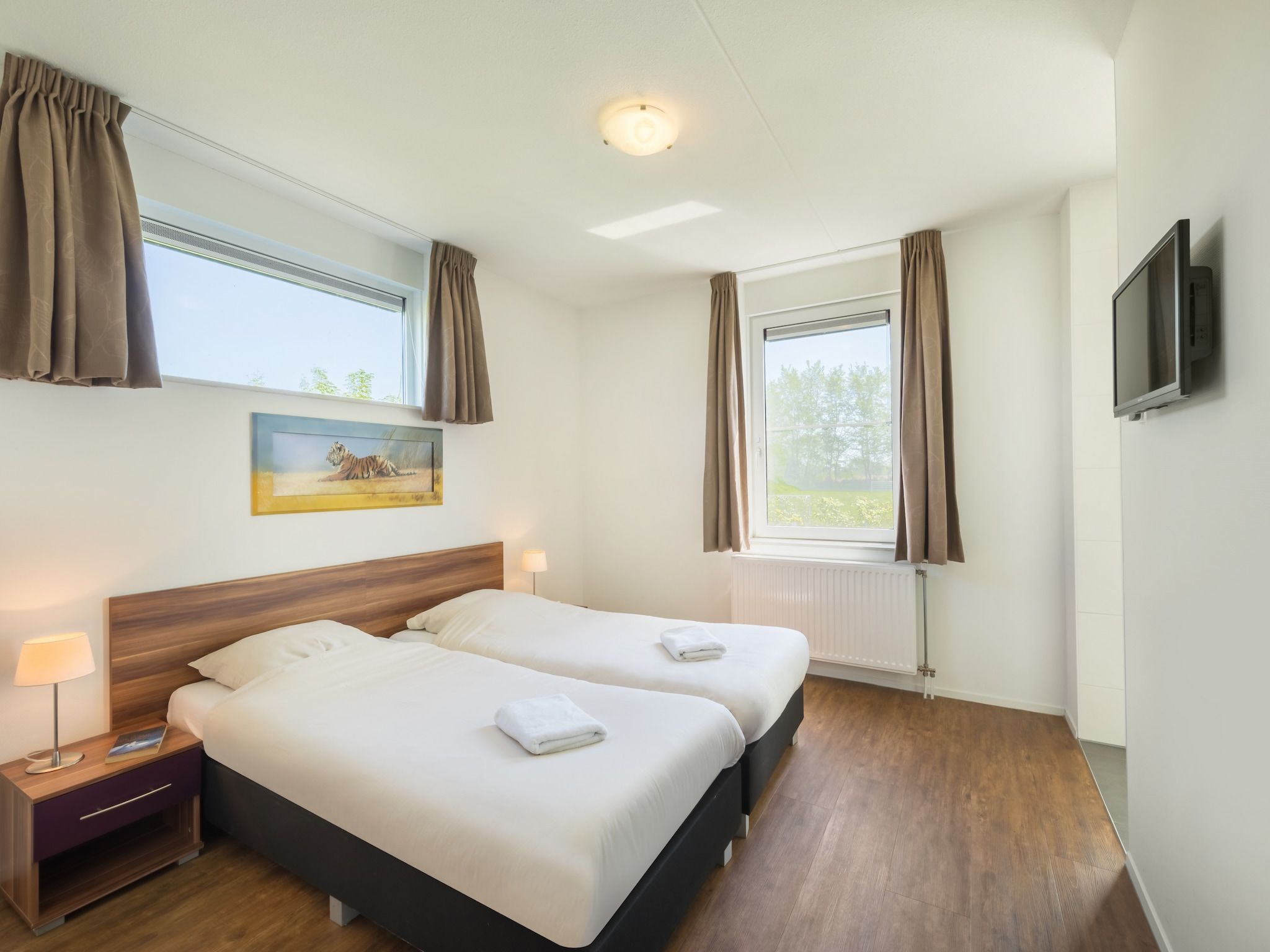 Een slaapkamer van Résidence de Weerribben 2 in Paasloo